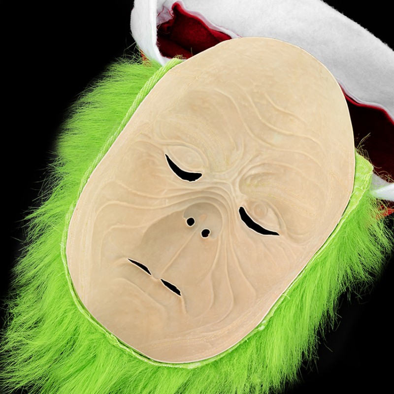 The green monster under the Christmas monster hat is strange and funny, with a hint of horror in the festive atmosphere Application Scenario