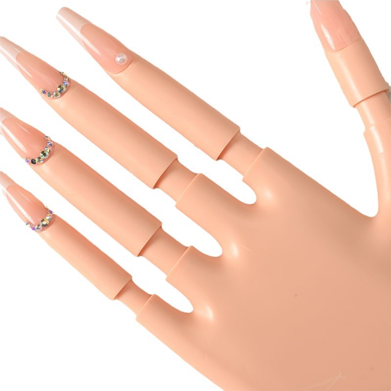 The new detachable practice prosthetic hand for nail art is made of silicone with movable palm and fingers and nail plates Item Picture