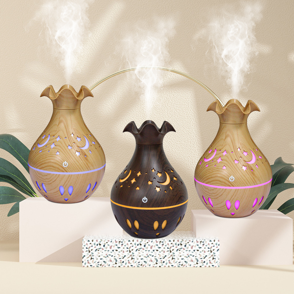 The hollowed-out vase humidifier and wood grain series are best-selling aromatherapy humidifying sprayers