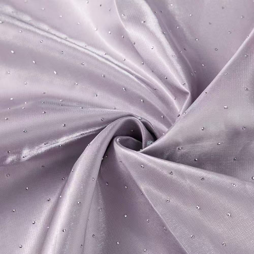 巴黎丝缎水光缎烫钻高亮液态面料婚纱礼服饰品箱包袖套涤纶丝绸面料反光材质细节图
