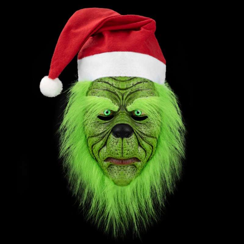 The green monster under the Christmas monster hat is strange and funny, with a hint of horror in the festive atmosphere Item Picture
