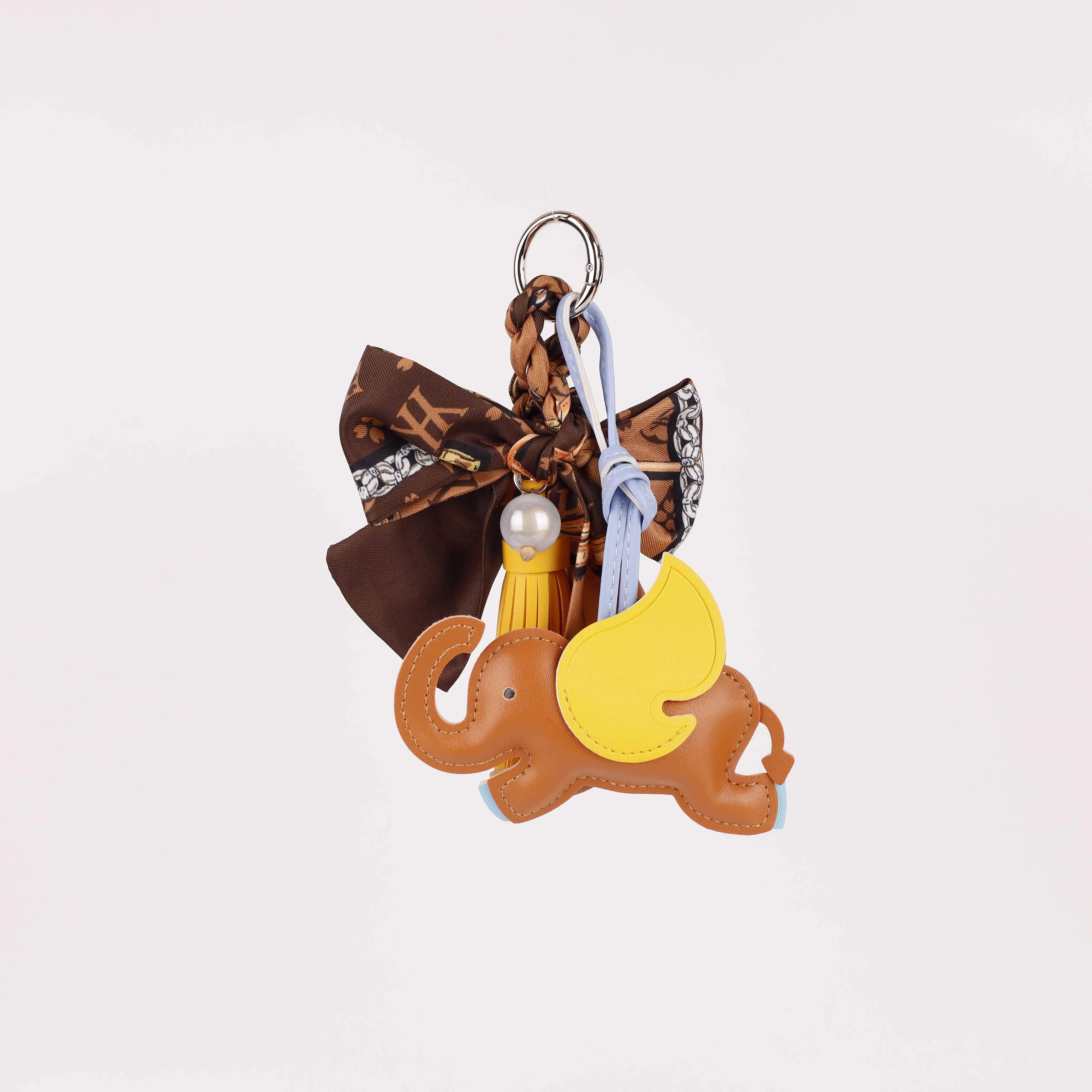 LV大象钥匙扣，萌趣设计搭配经典老花，时尚与童趣完美融合。