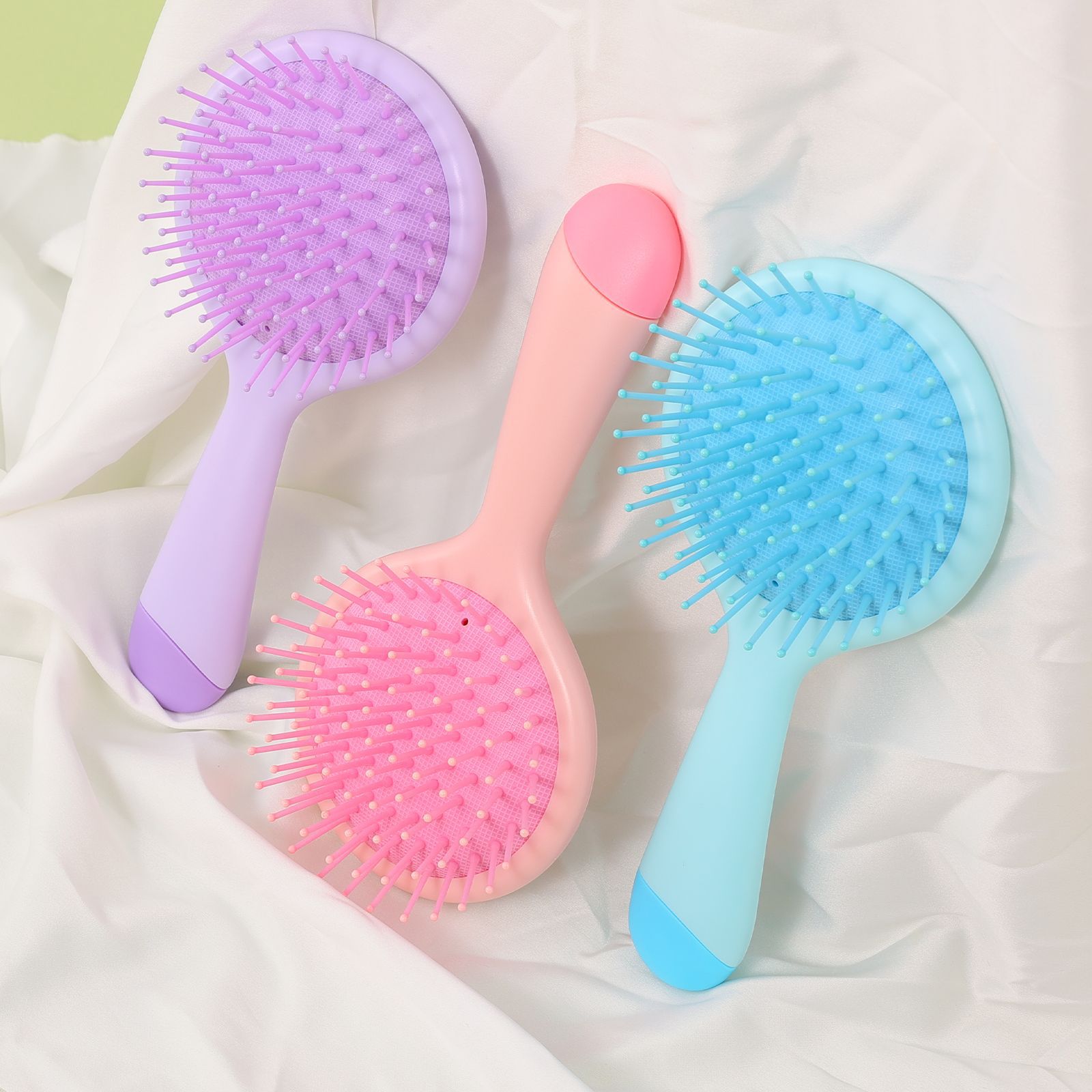 Baihe Cross-border Factory Direct sales dopamine round small comb, portable cute plastic hair care comb, cartoon hair care airbag comb details Picture