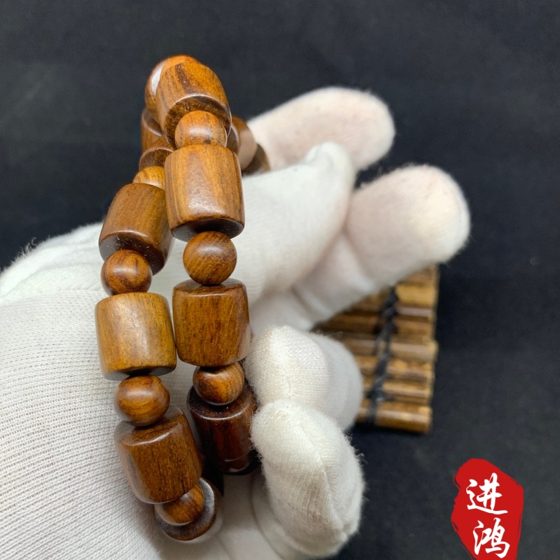 Black rosewood bracelet, bucket bead style, novel style and unique design, available for wholesale and retail Specification image