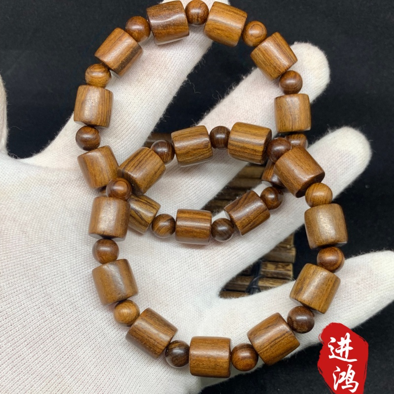 Black rosewood bracelet, bucket bead style, novel style and unique design, available for wholesale and retail details Picture