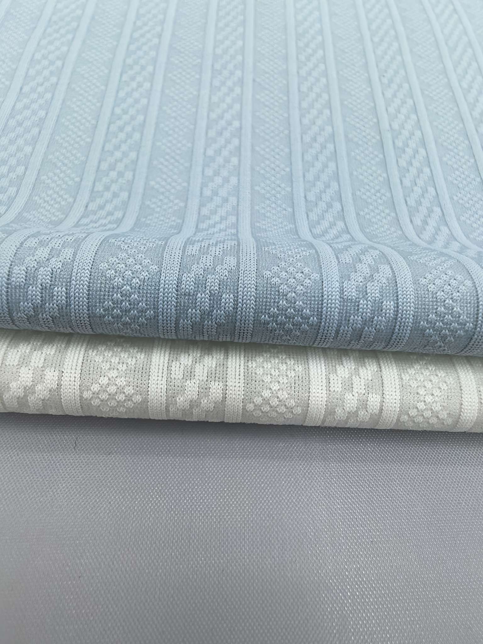 WKA90501 knitted knit knit knit knit jacquard fabric is suitable for men's business T-shirts and men's underwear. It is skin-friendly and soft. Innovative customized development based on samples Application Scenario