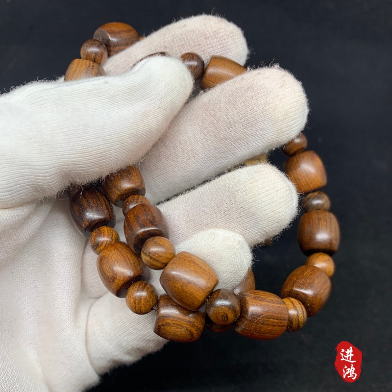 Black rosewood bracelet, drum bead style, novel style and unique design, available for wholesale and retail details Picture