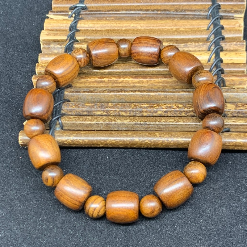 Black rosewood bracelet, drum bead style, novel style and unique design, available for wholesale and retail Application Scenario