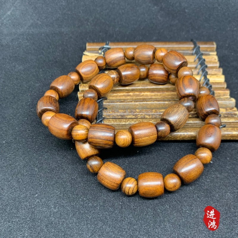 Black rosewood bracelet, drum bead style, novel style and unique design, available for wholesale and retail Specification image