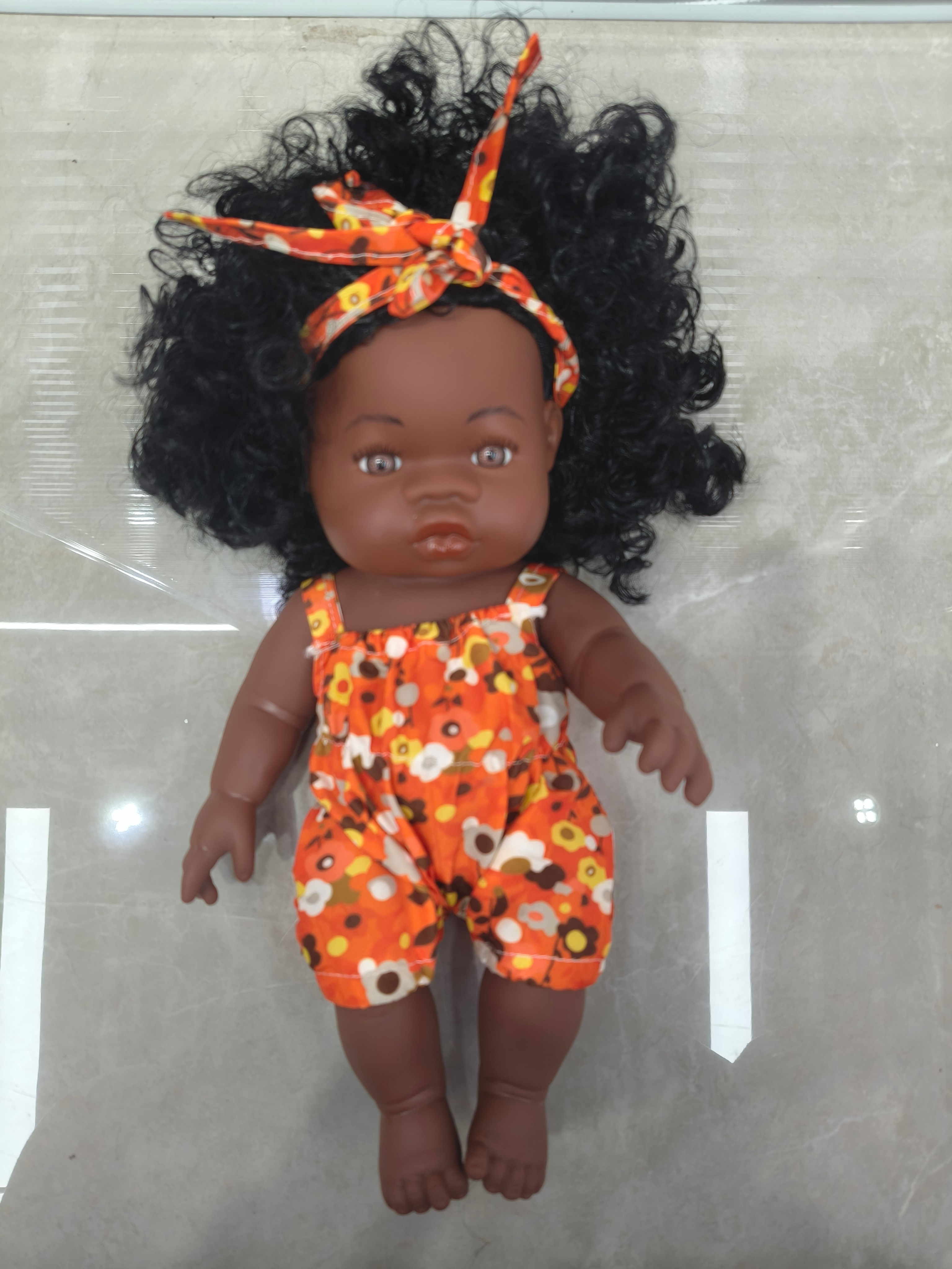 30 cm realistic soft rubber black girl doll, baby toy doll Item Picture