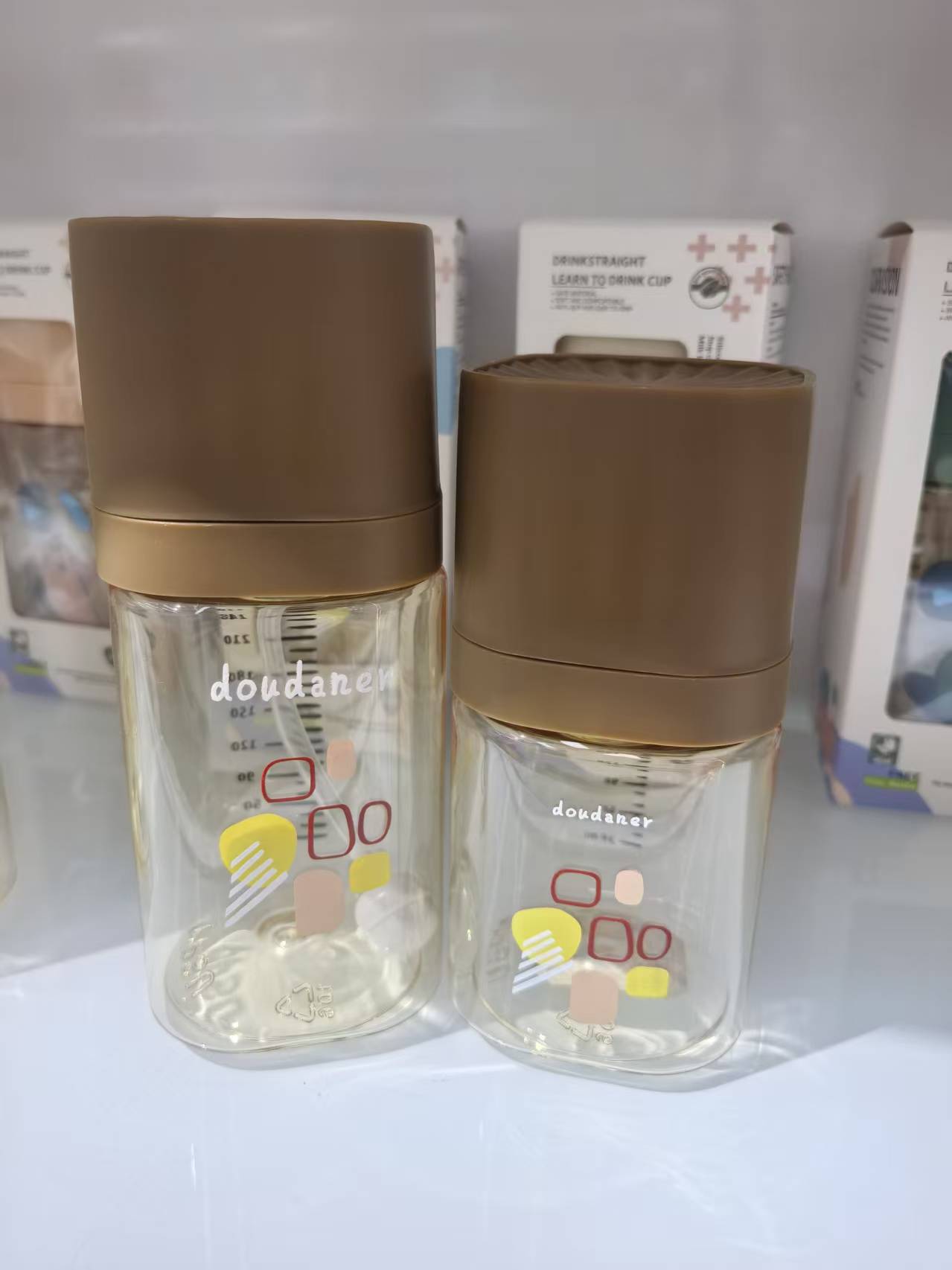 婴儿奶瓶 母婴用品  硅胶防胀气奶嘴方形奶瓶 270ML 180ML 可爱猫头宽口塑料奶瓶白底实物图