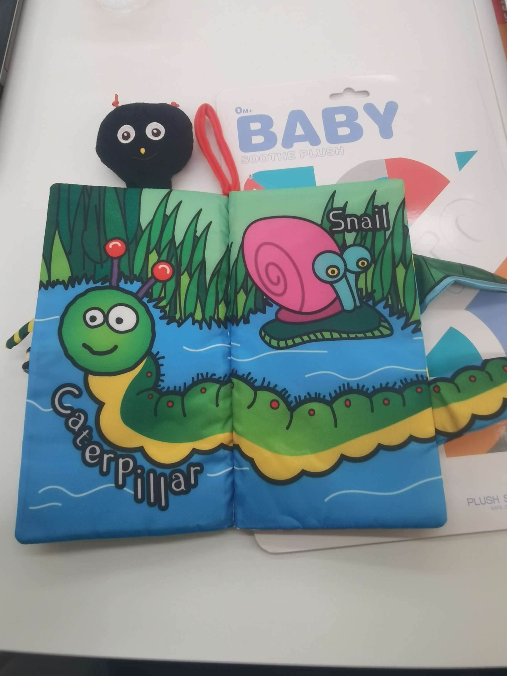 小天乐萌趣早教摇铃婴儿安抚玩具哄睡神器宝宝舒适感幼儿玩具布书产品图