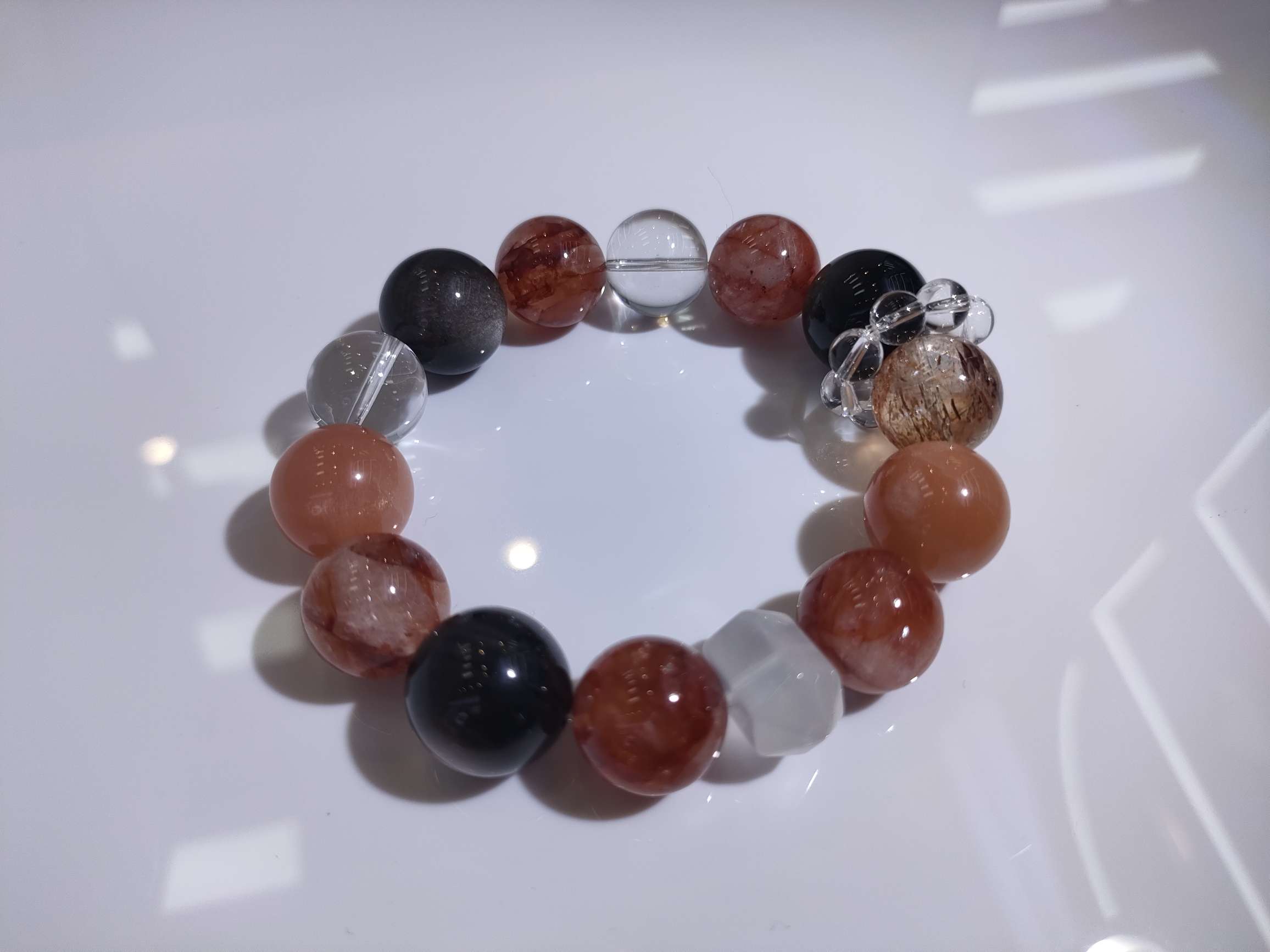 红胶花银曜石白水晶橙月光黑金超七奶白晶双尖天然水晶20mm详情图3