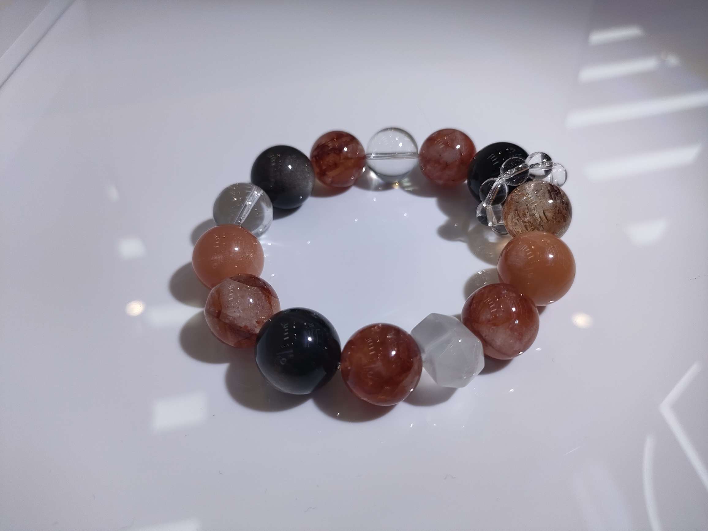 红胶花银曜石白水晶橙月光黑金超七奶白晶双尖天然水晶20mm产品图