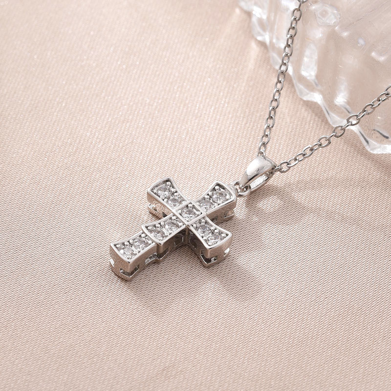 This is a popular copper-plated real gold cross necklace accessory in Europe and America. It features a simple pendant set with zircon and is versatile and trendy in Southeast Asia