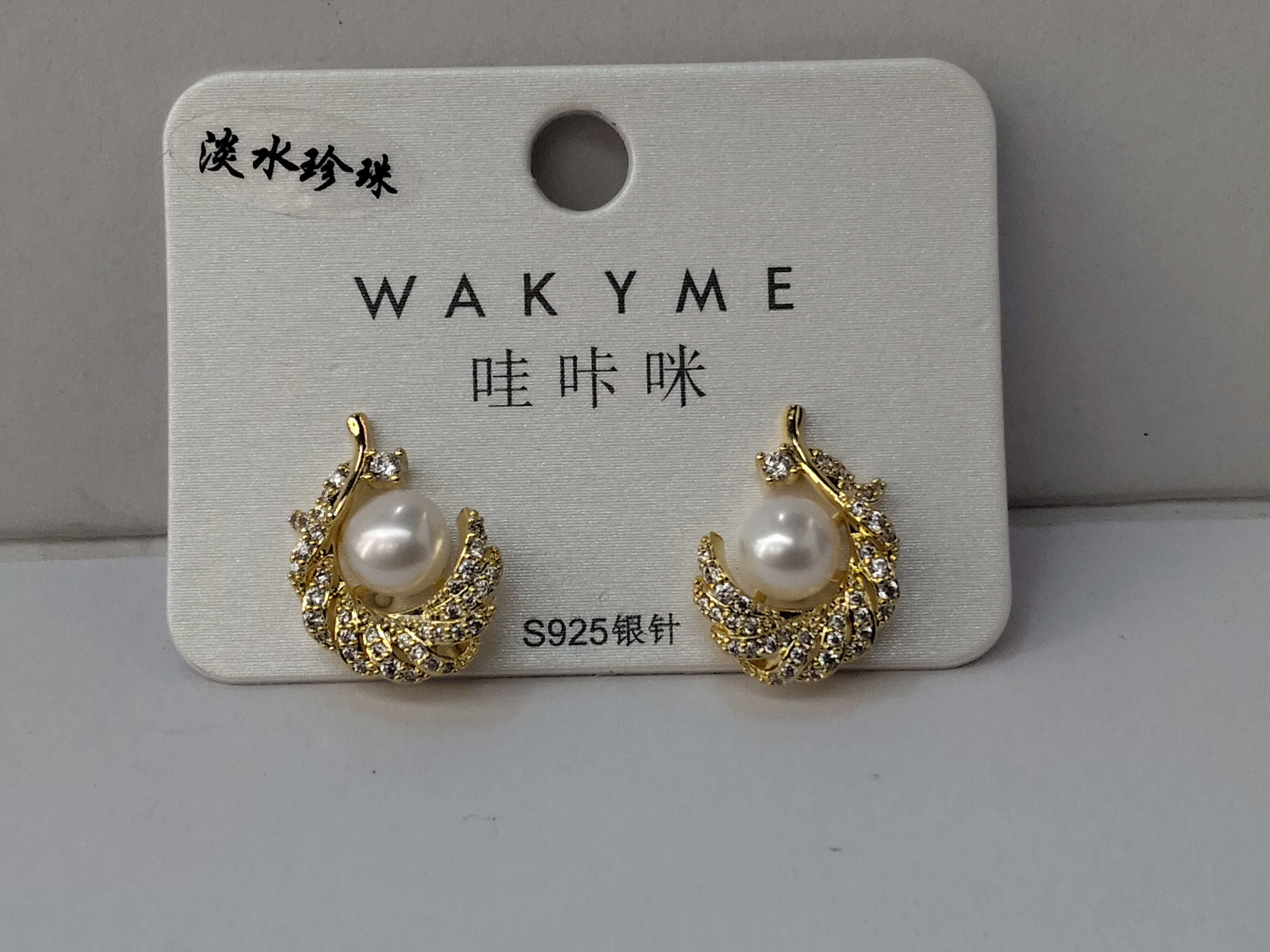 Waka Mi 2025 freshwater pearl stud earrings, S925 silver needle inlaid with shining zircon, elegant design exudes noble temperament. Item Picture