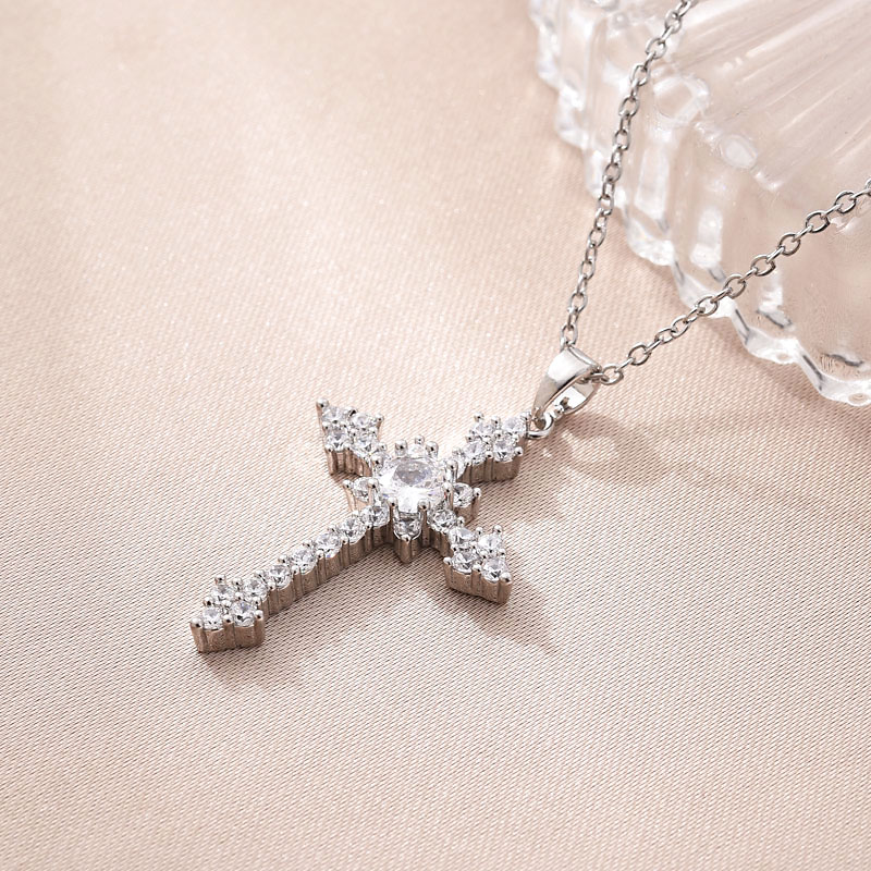 This is a popular copper-plated real gold cross necklace accessory in Europe and America. It features a simple pendant set with zircon and is versatile and trendy in Southeast Asia details Picture