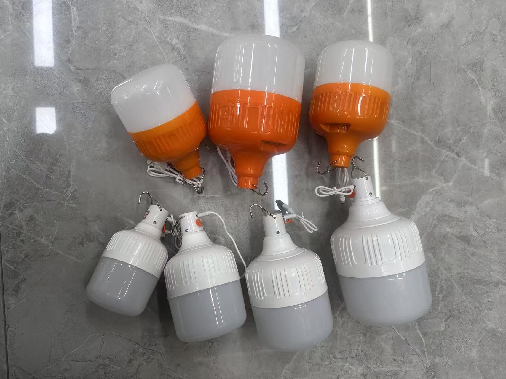 5V LED charging emergency bulb, usb bulb lamp, household energy-saving bulb, indoor and outdoor lighting, screw-top T-bulb, constant current 10w, outdoor camping hook model Application Scenario