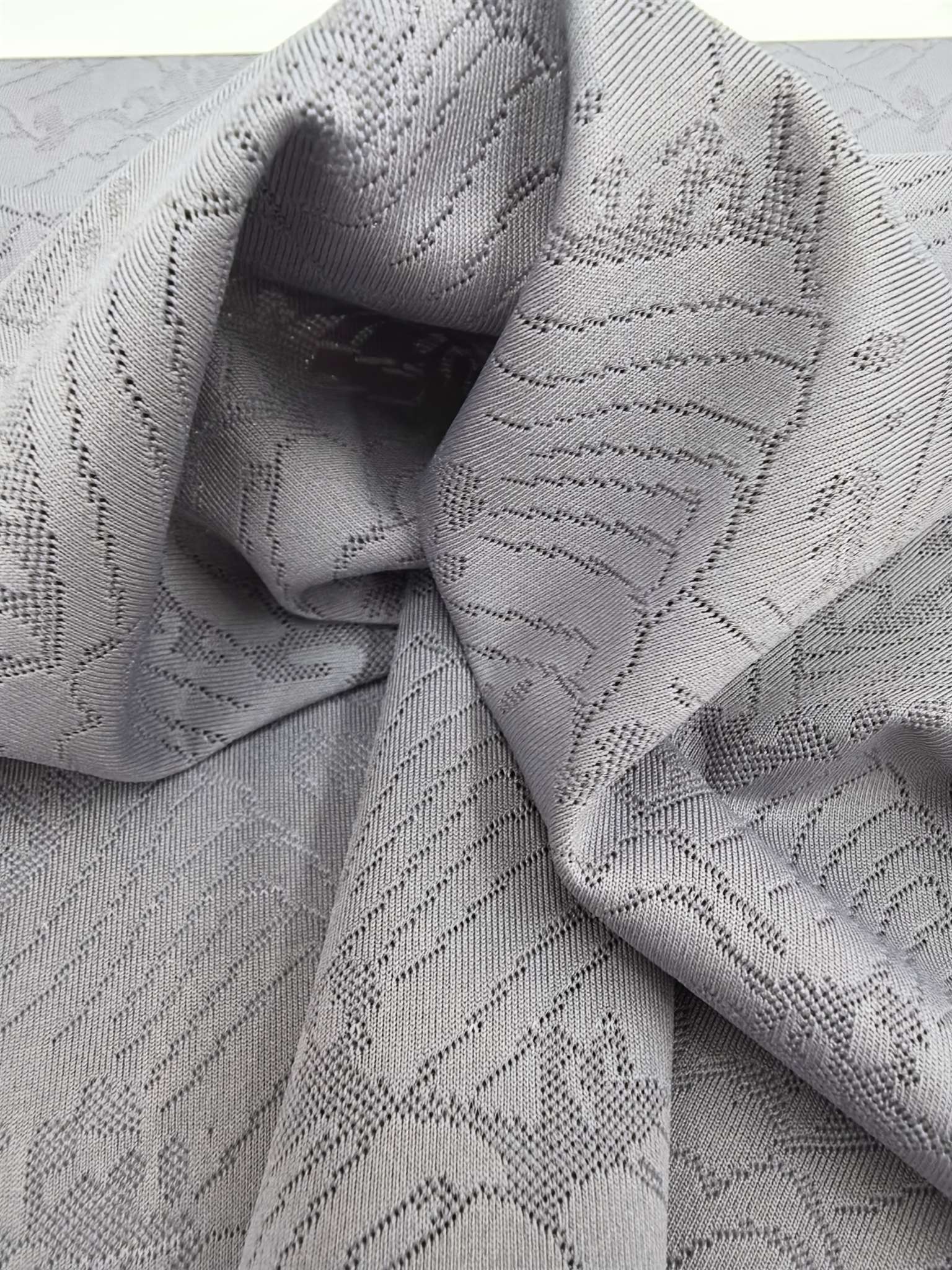 KWA90731 polyester knitted close-knit jacquard fabric with single-sided hanging surface is suitable for sports, quick-drying, soft and skin-friendly. It is independently developed and customized based on samples detail image 4