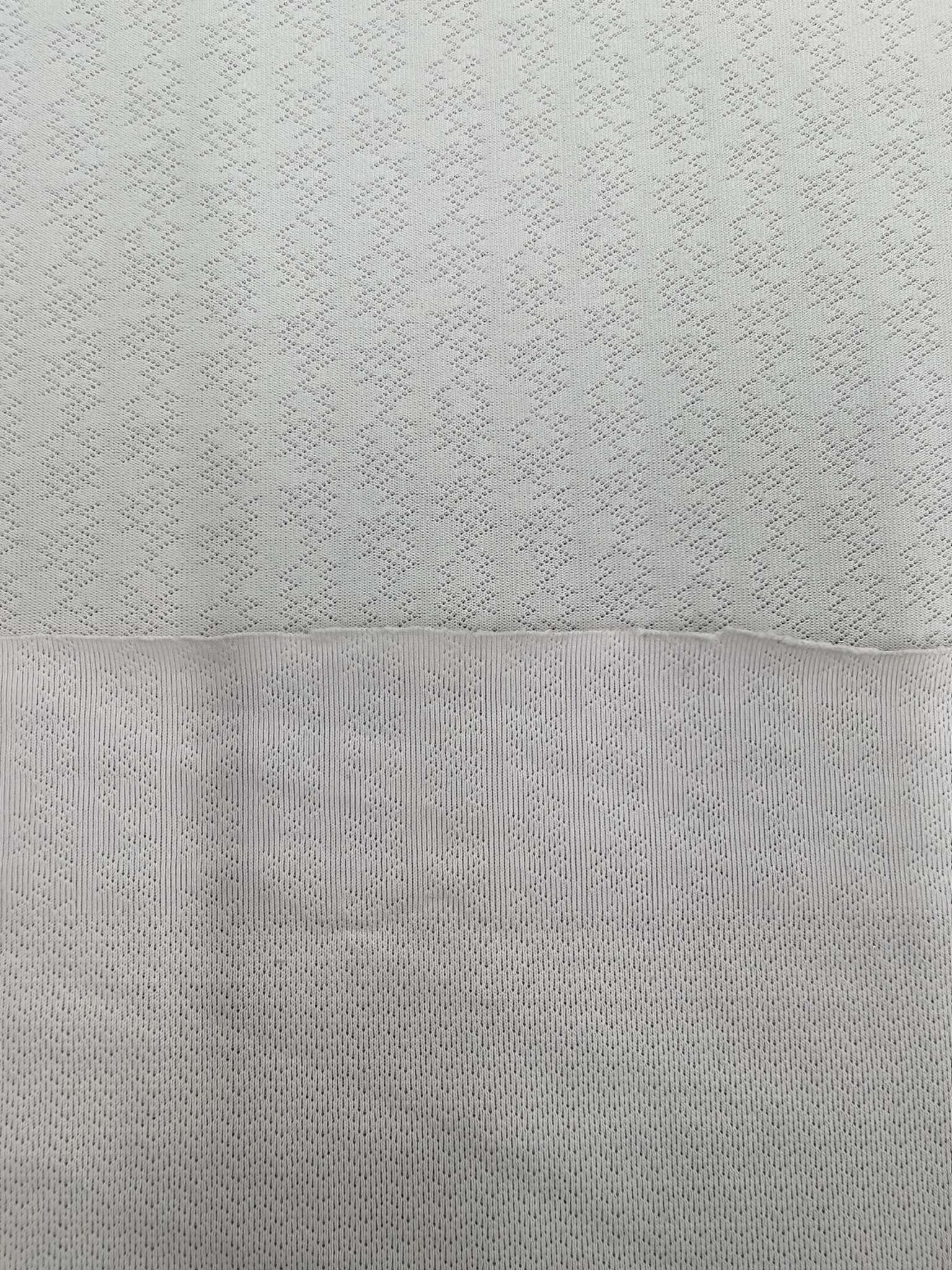 WKA90673 polyester knitted close-knit jacquard fabric is skin-friendly and soft, suitable for men's T-shirts and men's underwear. It is independently innovated, developed and customized based on samples detail image 2