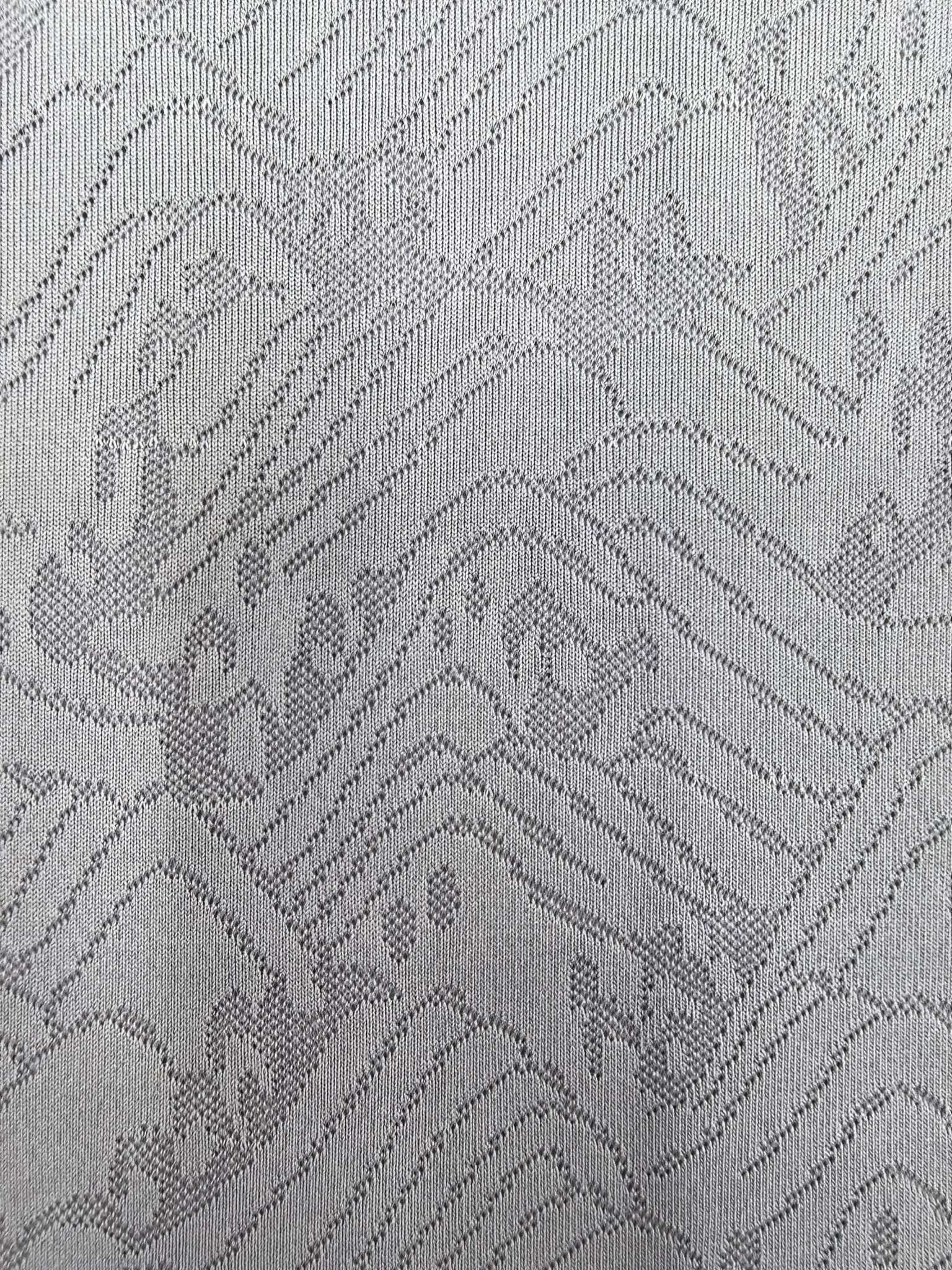 KWA90731 polyester knitted close-knit jacquard fabric with single-sided hanging surface is suitable for sports, quick-drying, soft and skin-friendly. It is independently developed and customized based on samples