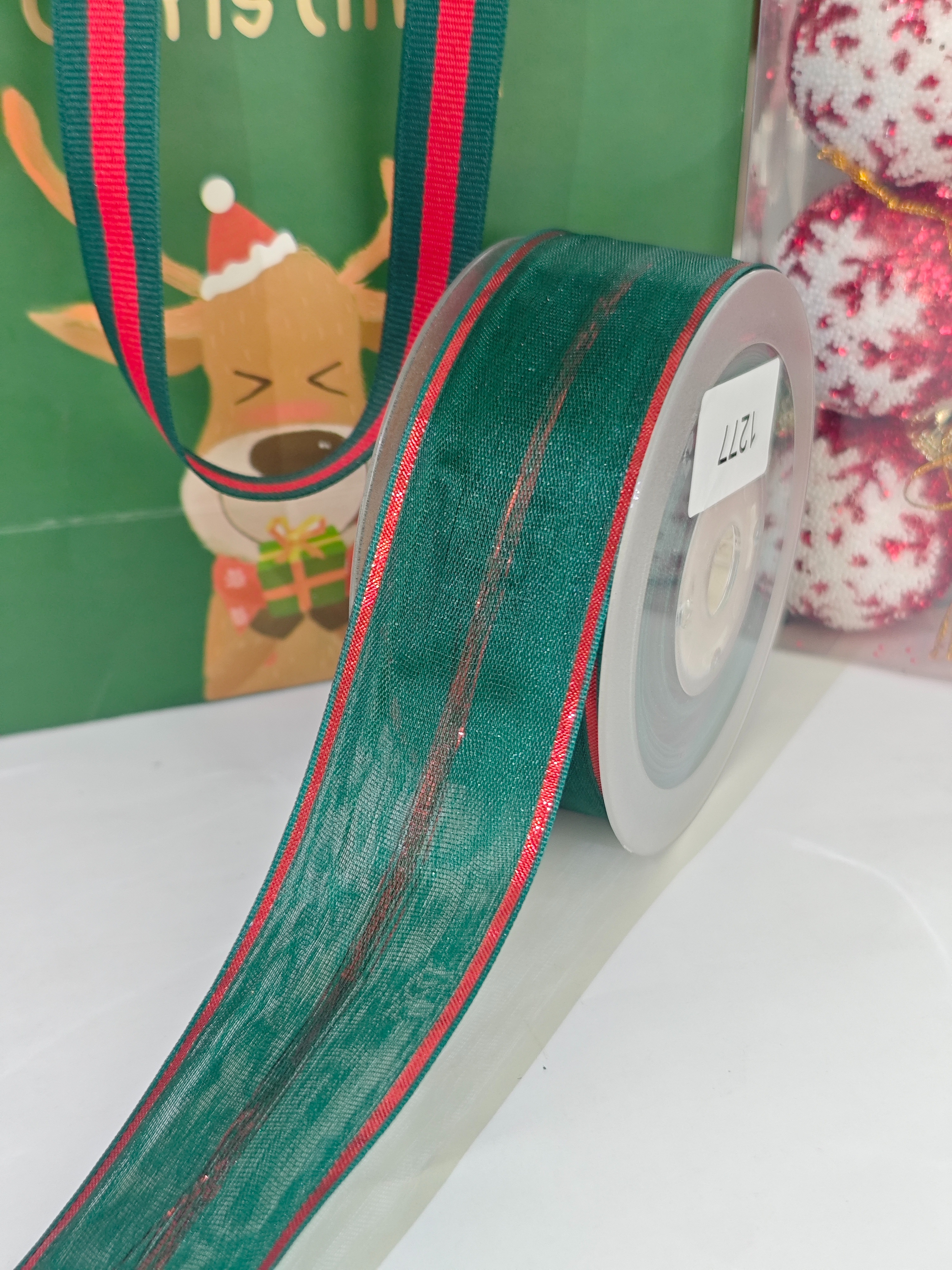 Item No. : 1277 Christmas Gift Packaging Decoration DIY Double-layer Red stripe Red onion green edge # Dark green Iron Christmas Ribbon 3.8cm Application Scenario