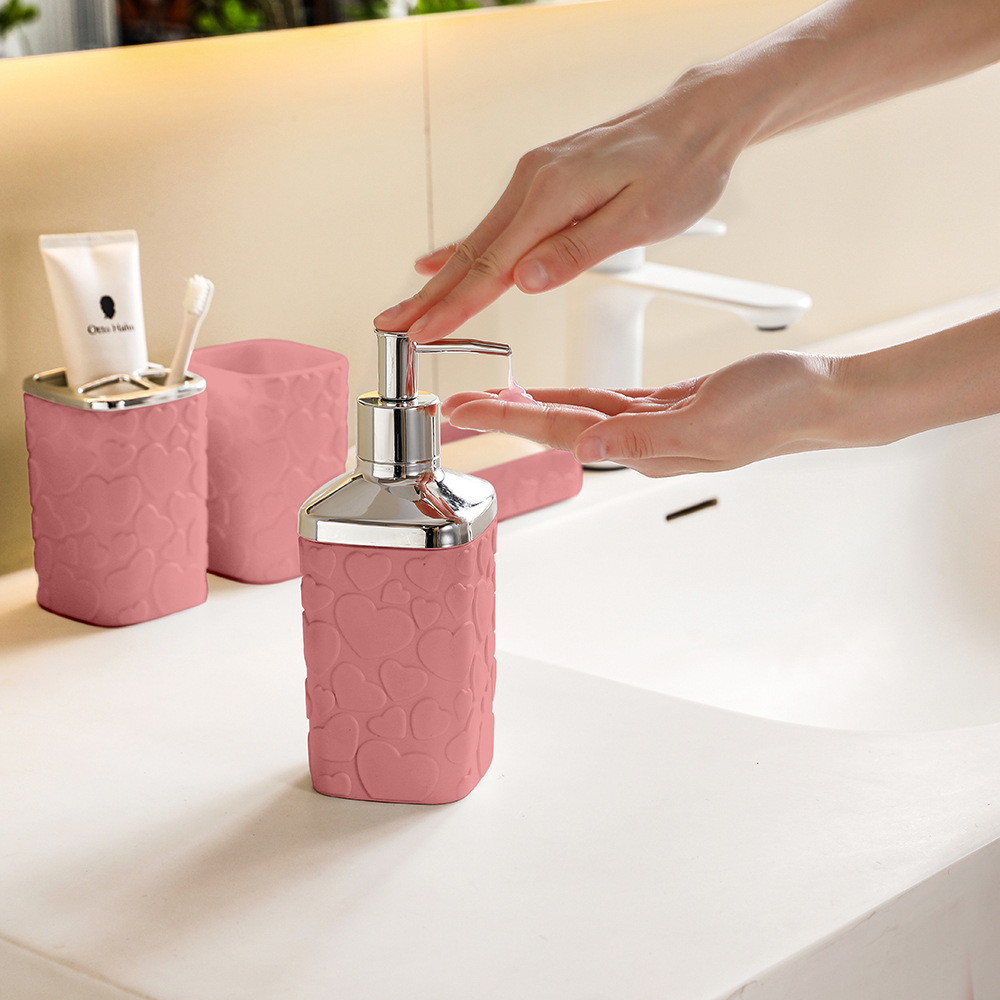 Hot-selling heart-shaped relief bathroom 4-piece set, hotel and household plastic cups, lotion bottles, mouthwash cups 4-piece set Specification image