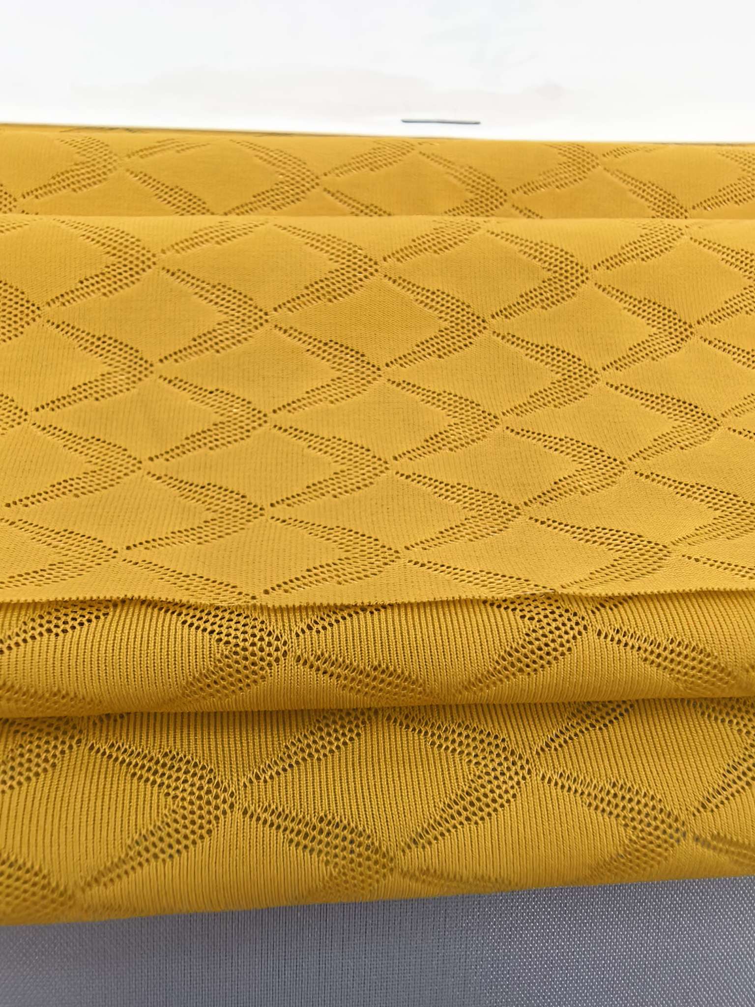 KWA90514 nylon knitted close-knit jacquard fabric, single-sided skin-friendly and soft, ice-silk cool feeling mesh, suitable for underwear, ice sleeves, gloves, masks and face masks. Independently innovated and developed in a targeted manner, custom-made based on samples Specification image