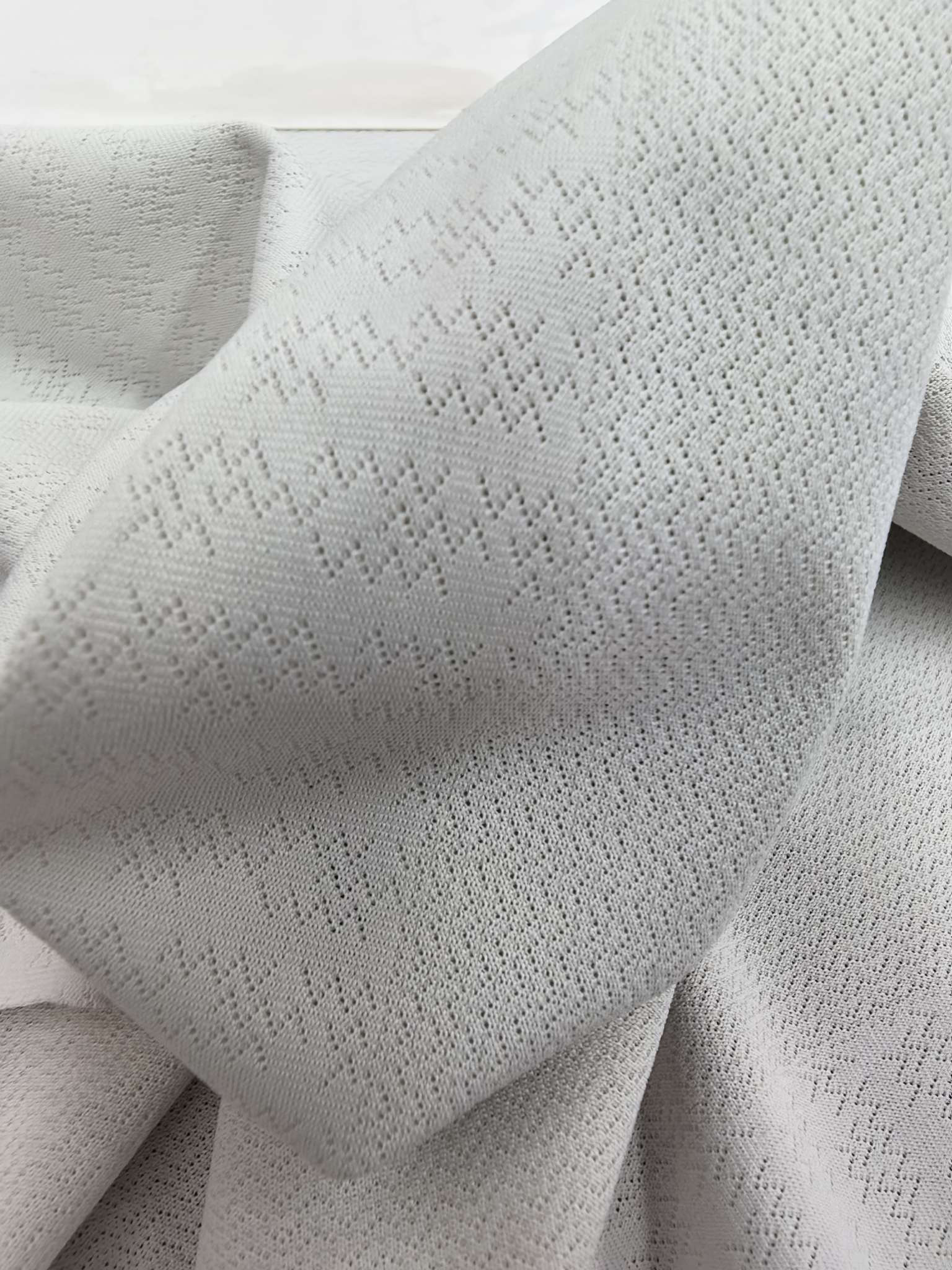 WKA90673 polyester knitted close-knit jacquard fabric is skin-friendly and soft, suitable for men's T-shirts and men's underwear. It is independently innovated, developed and customized based on samples detail image 4