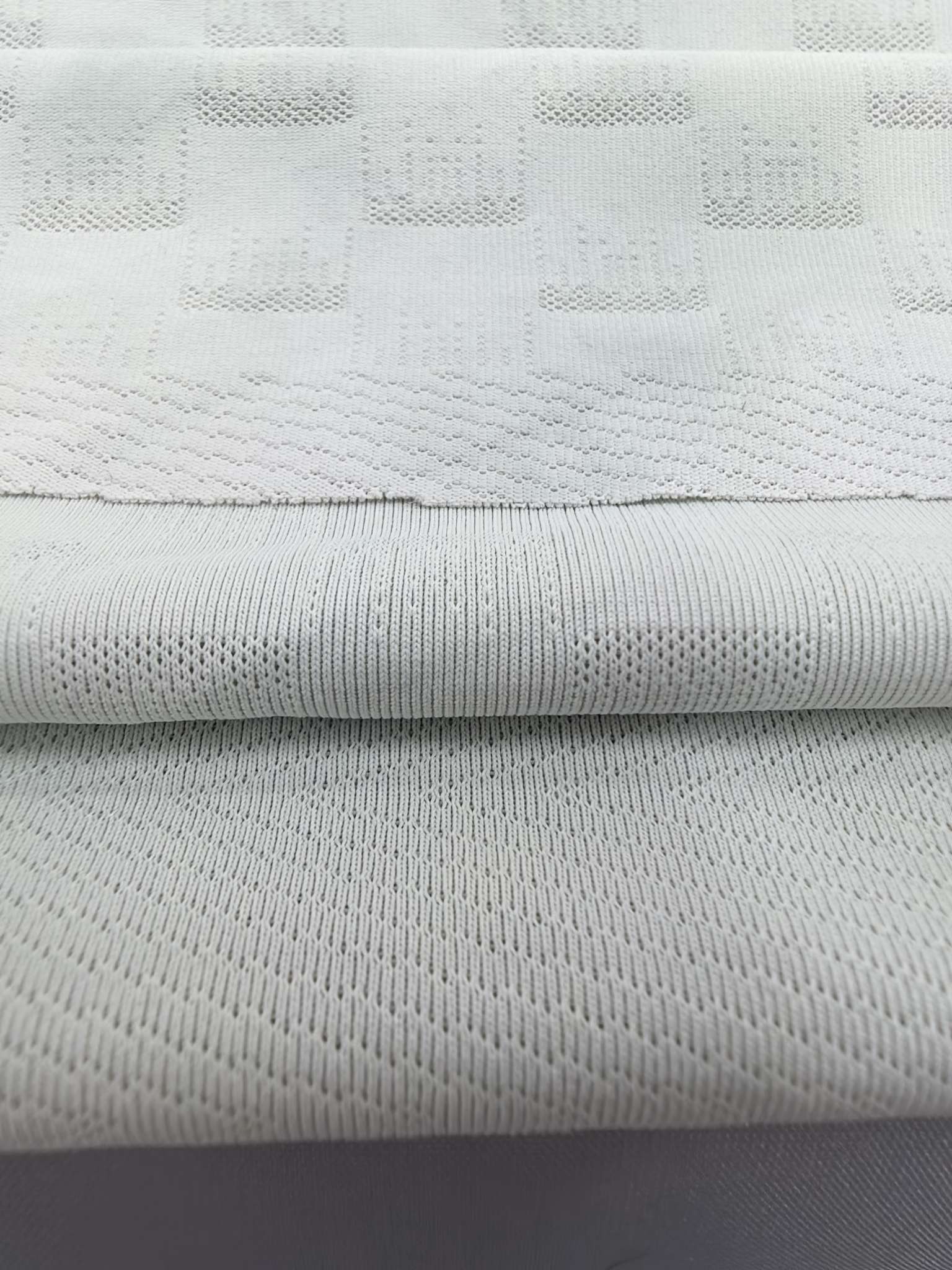 KWA90672 polyester knitted close-knit jacquard fabric, single-sided spring and summer new style, suitable for men's T-shirts and men's underwear. Skin-friendly and soft, independently innovative, customized development based on samples detail image 3