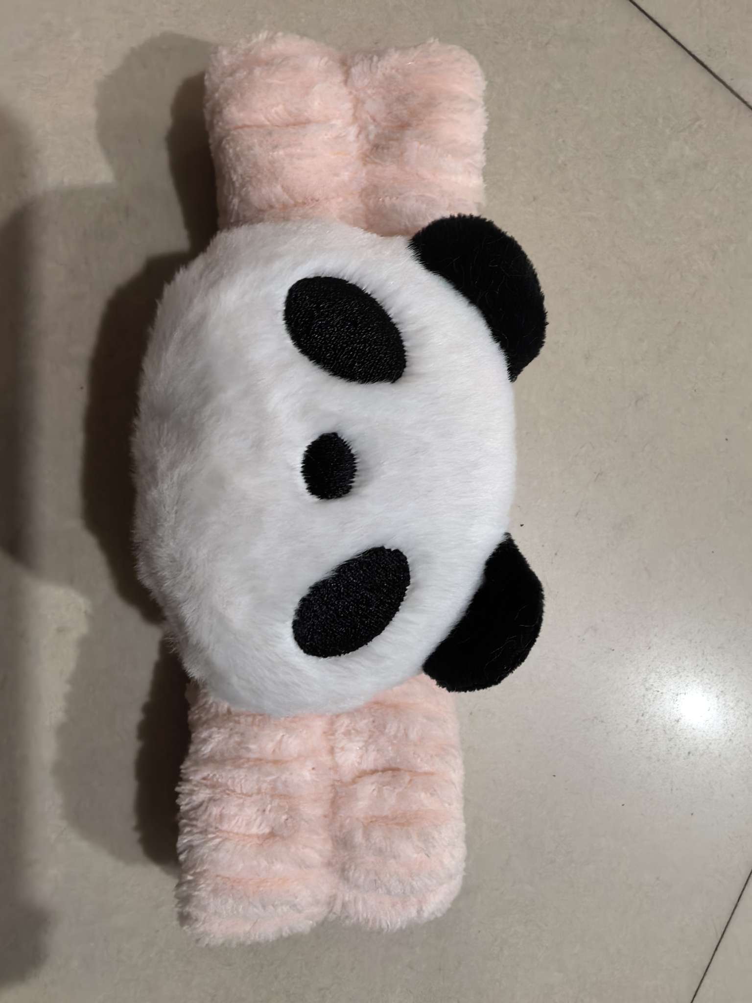 The cute and trendy hair band with a cartoon panda and a beautiful light pink hair band is super beautiful and good-looking