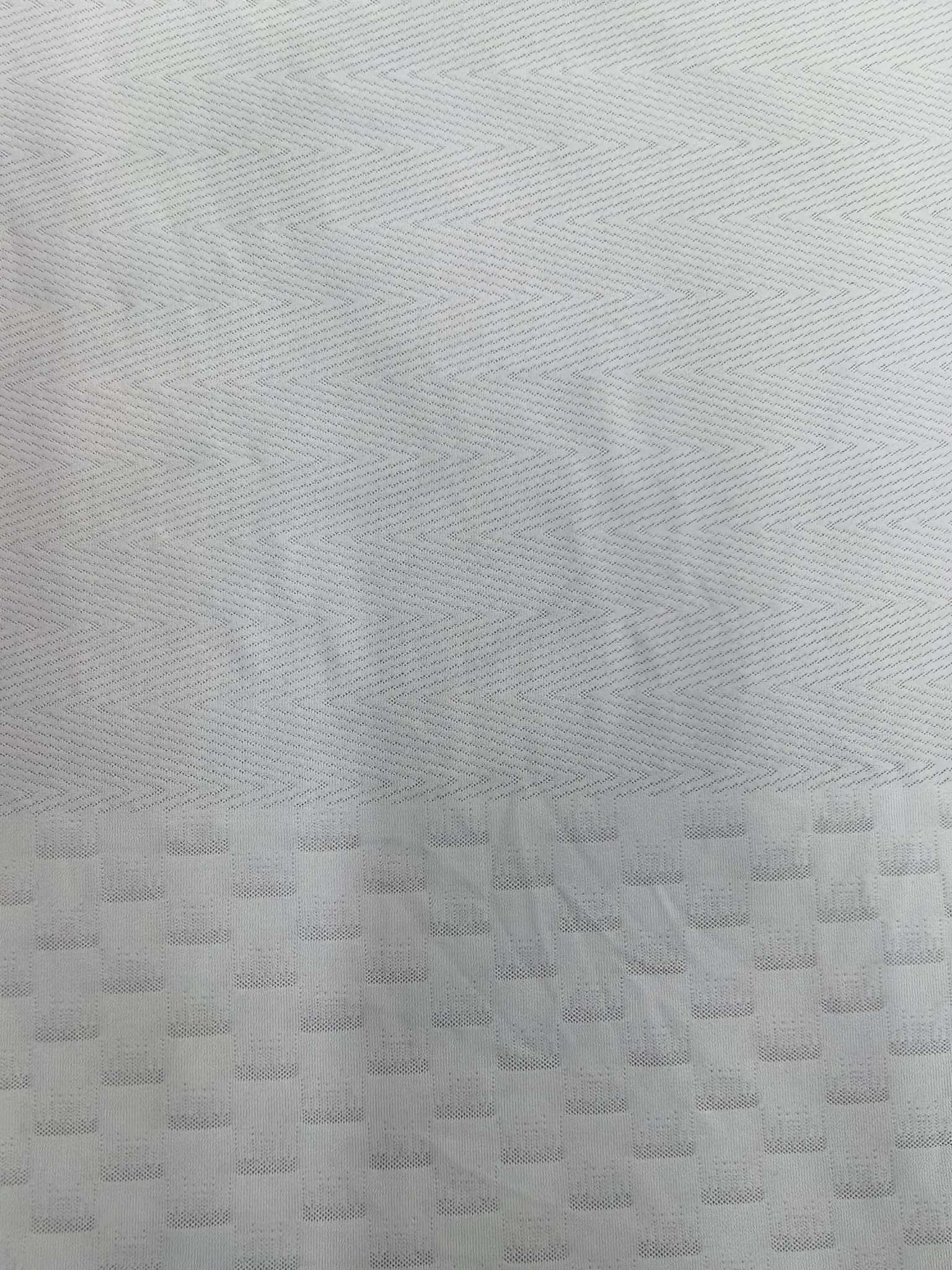 KWA90672 polyester knitted close-knit jacquard fabric, single-sided spring and summer new style, suitable for men's T-shirts and men's underwear. Skin-friendly and soft, independently innovative, customized development based on samples