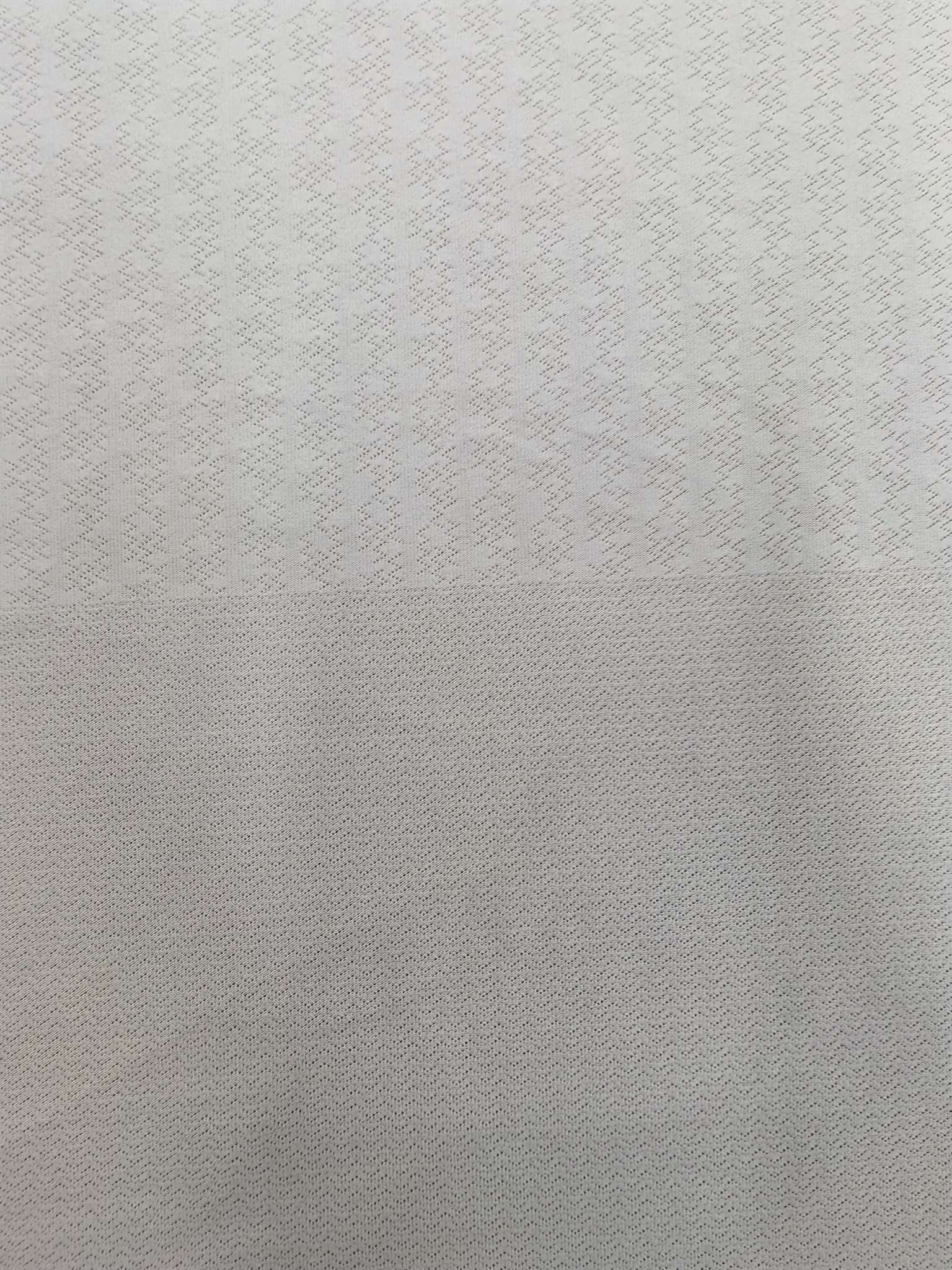 WKA90673 polyester knitted close-knit jacquard fabric is skin-friendly and soft, suitable for men's T-shirts and men's underwear. It is independently innovated, developed and customized based on samples