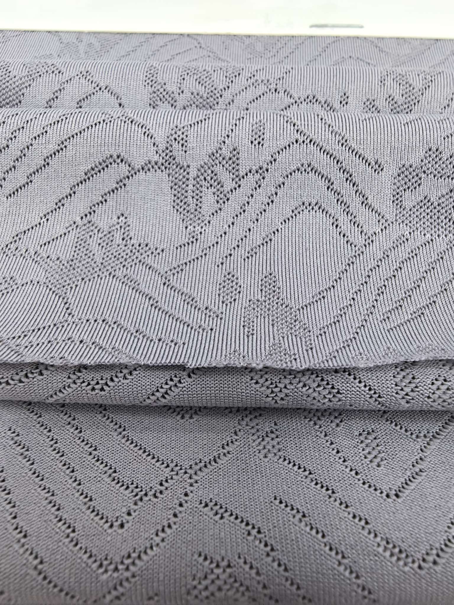 KWA90731 polyester knitted close-knit jacquard fabric with single-sided hanging surface is suitable for sports, quick-drying, soft and skin-friendly. It is independently developed and customized based on samples detail image 3