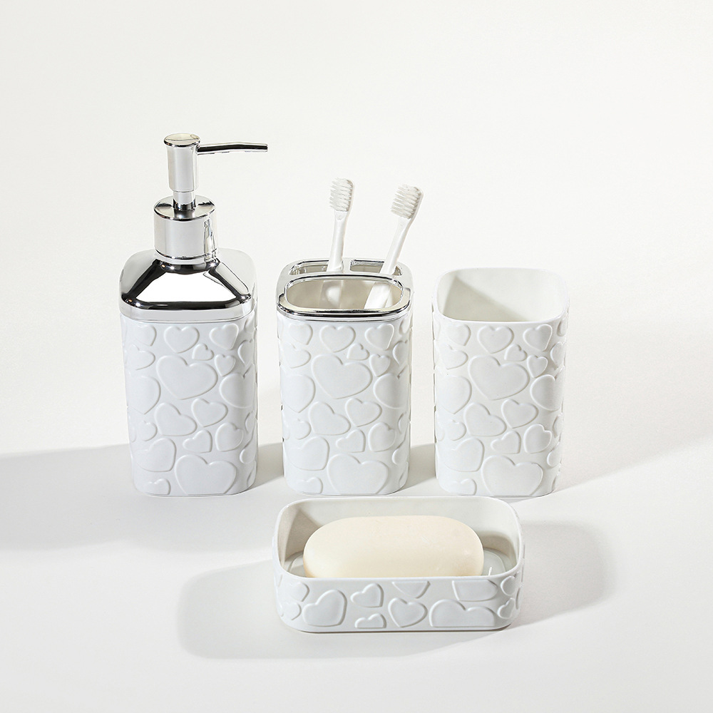 Hot-selling heart-shaped relief bathroom 4-piece set, hotel and household plastic cups, lotion bottles, mouthwash cups 4-piece set Application Scenario