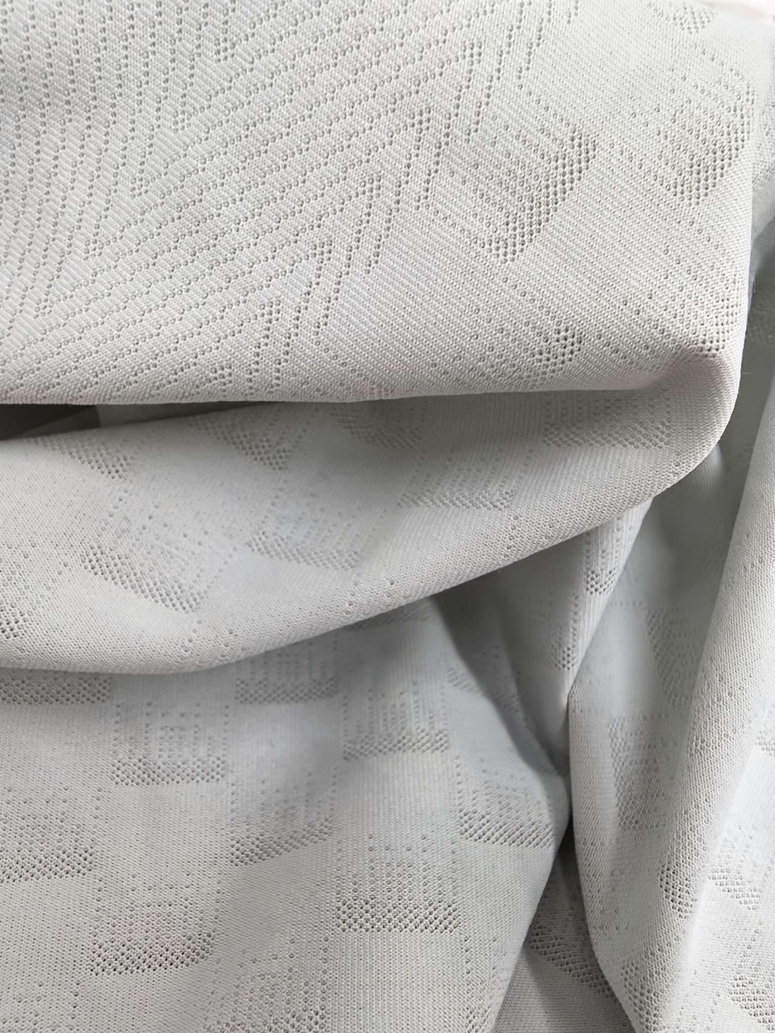 KWA90672 polyester knitted close-knit jacquard fabric, single-sided spring and summer new style, suitable for men's T-shirts and men's underwear. Skin-friendly and soft, independently innovative, customized development based on samples Application Scenario