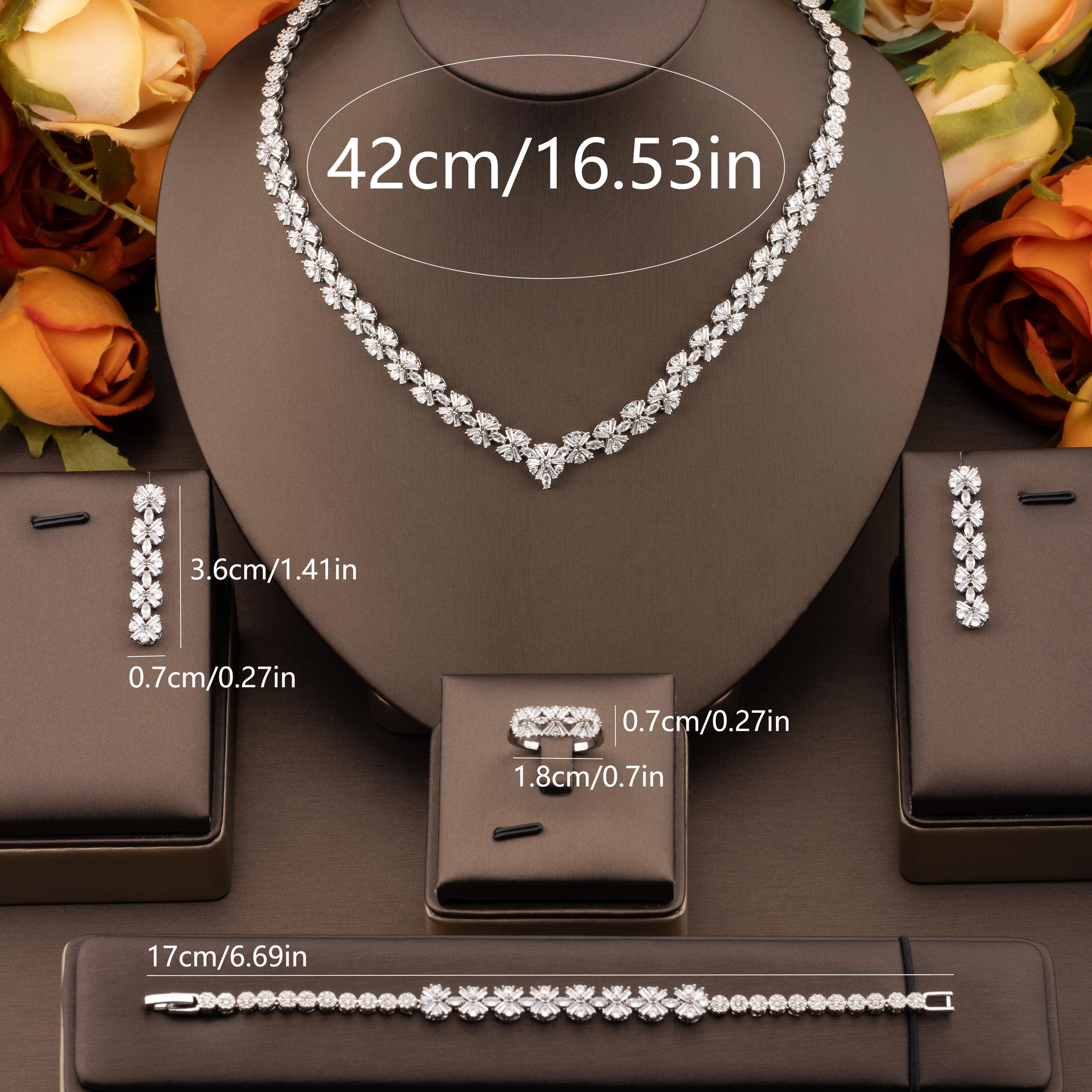 A luxurious and elegant cubic zirconia V-neck small butterfly jewelry set is suitable for ladies to wear at their weddings Item Picture