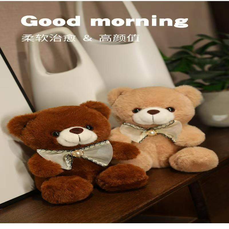 Small, colorful pearl bow, sitting teddy bear plush toy, little bear hug bear doll details Picture