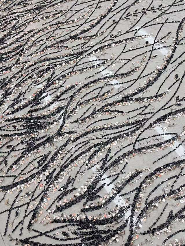 Fabric processing and customization for wedding dresses and evening gowns: A wide range of sequin fabrics to choose from Item Picture