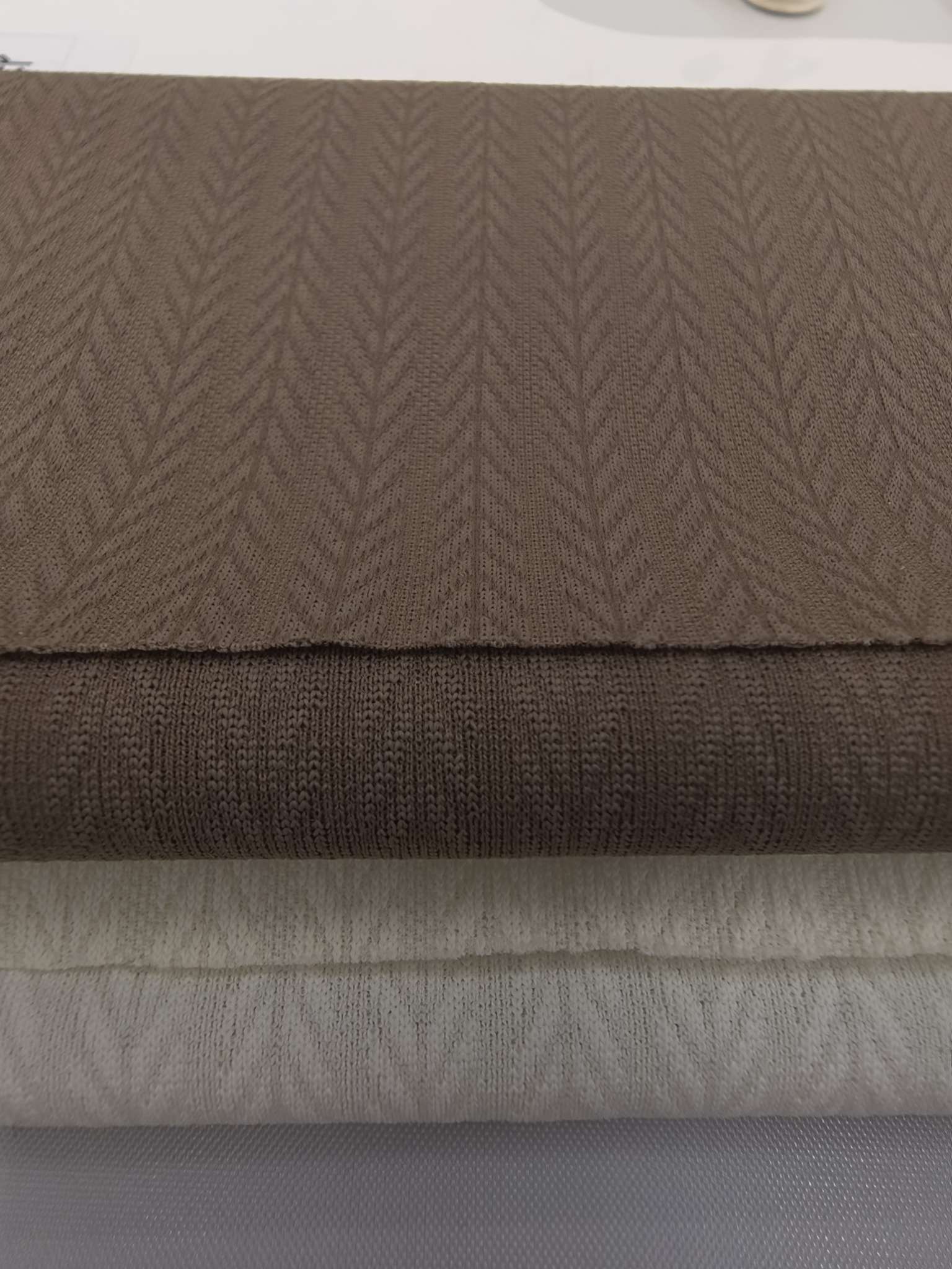 WKS90158 nylon knitted close-knit jacquard double-sided fabric is skin-friendly, soft and has a good drape. It is suitable for business men's clothing. Independent innovation, targeted development and sample customization Application Scenario