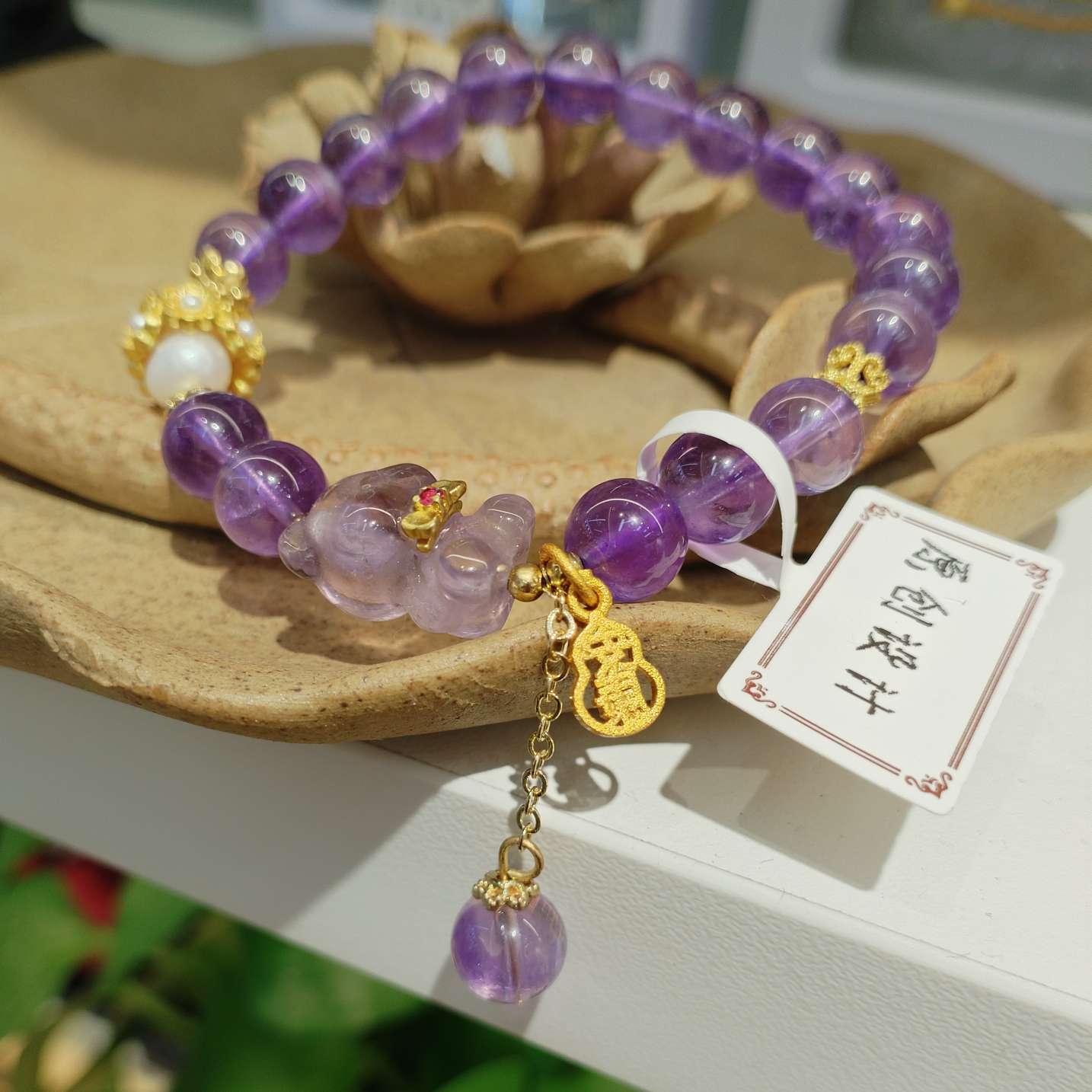 8mm natural amethyst bracelet paired with pearl bracelet is a fashionable and versatile accessory for women. It features a simple and trendy look with an elegant style Item Picture