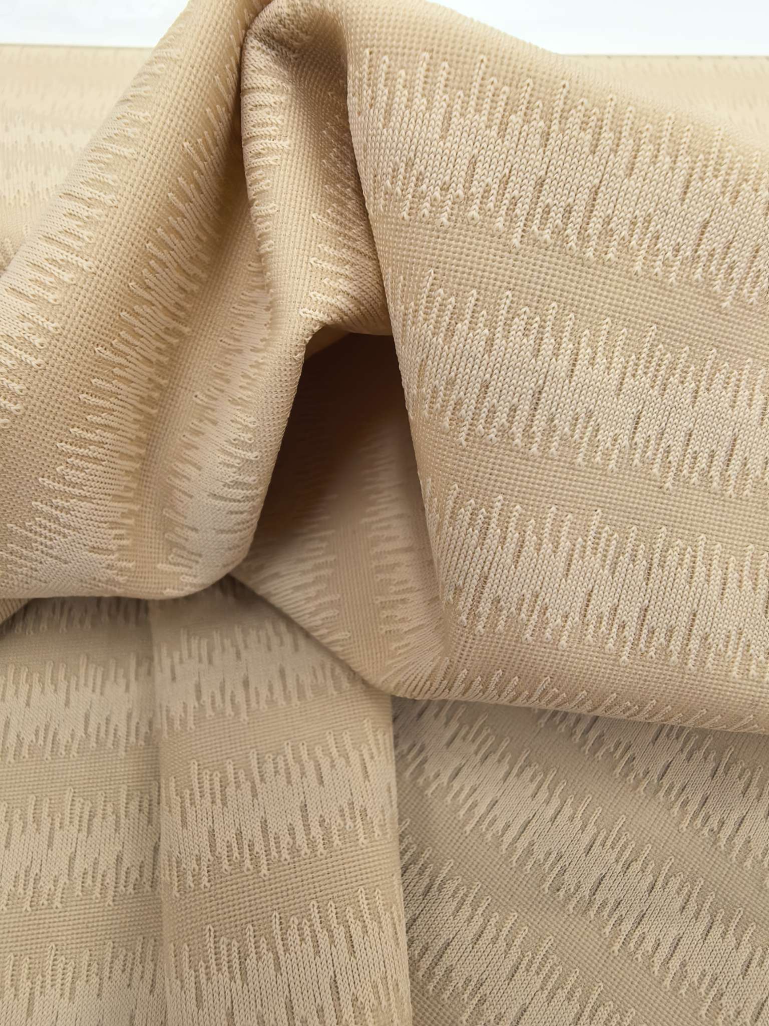 WKA90408 nylon knitted close-knit jacquard fabric is skin-friendly, soft and has a great drape. It is suitable for business men's wear. It is independently innovated, developed and customized according to samples Application Scenario