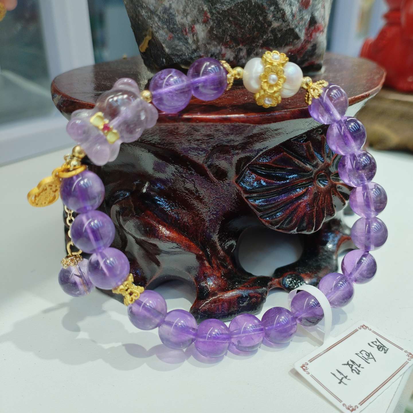 8mm natural amethyst bracelet paired with pearl bracelet is a fashionable and versatile accessory for women. It features a simple and trendy look with an elegant style Specification image