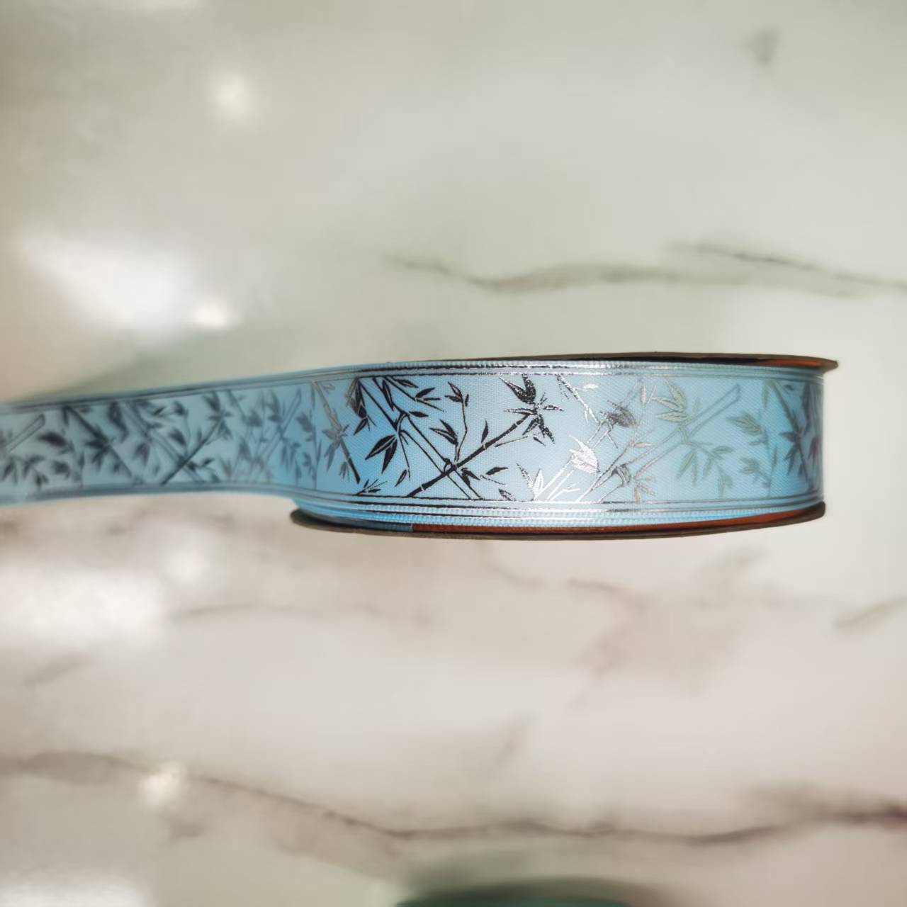2.5 cm polyester ribbon silver-embossed bamboo leaf clothing accessories, DIY handmade bow, customizable patterns available Specification image