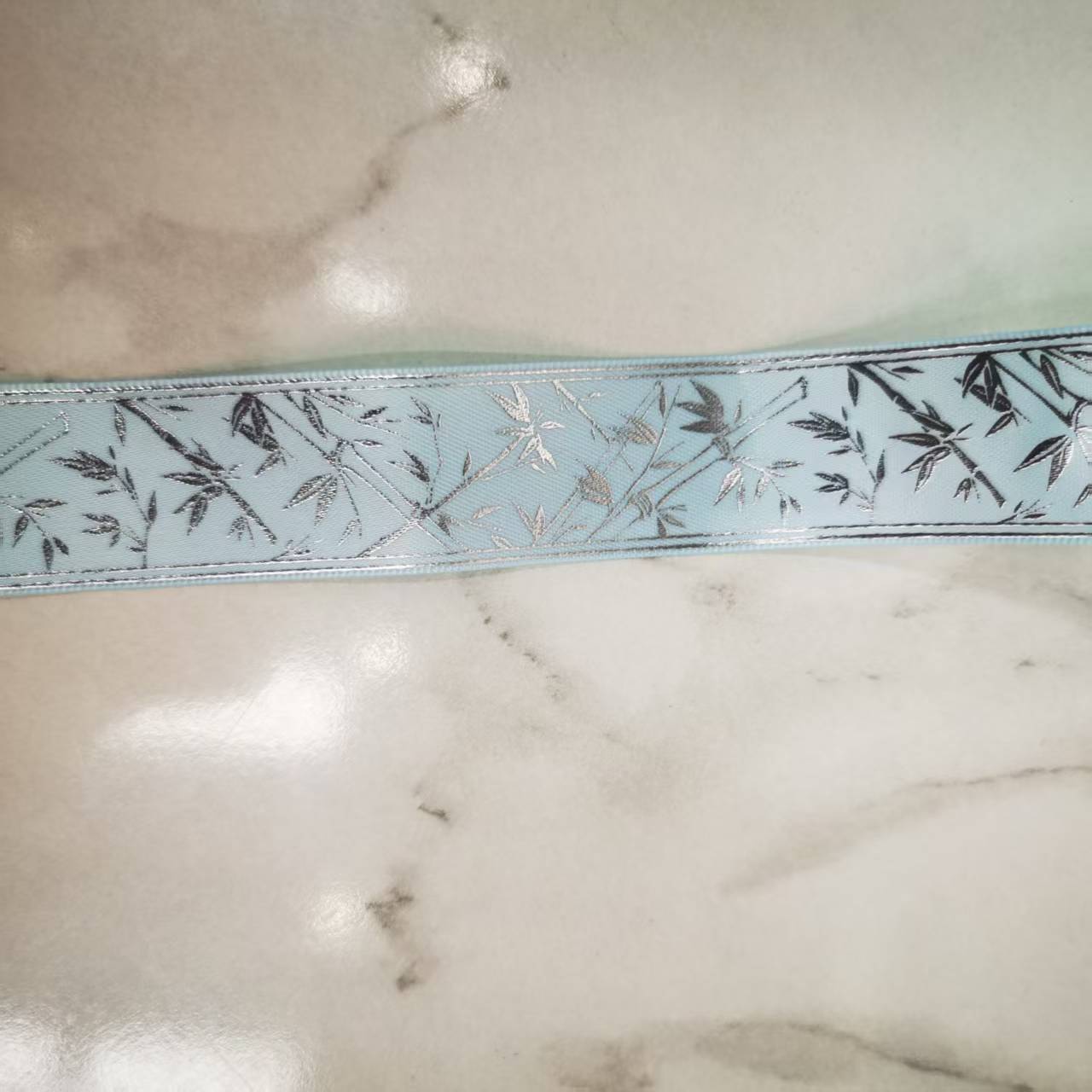 2.5 cm polyester ribbon silver-embossed bamboo leaf clothing accessories, DIY handmade bow, customizable patterns available Item Picture