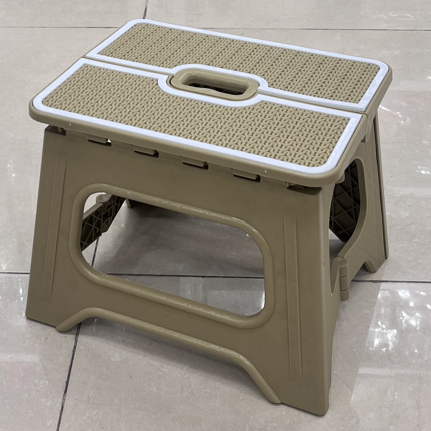 A thickened plastic stool for home use, anti-slip, durable and foldable square small stool