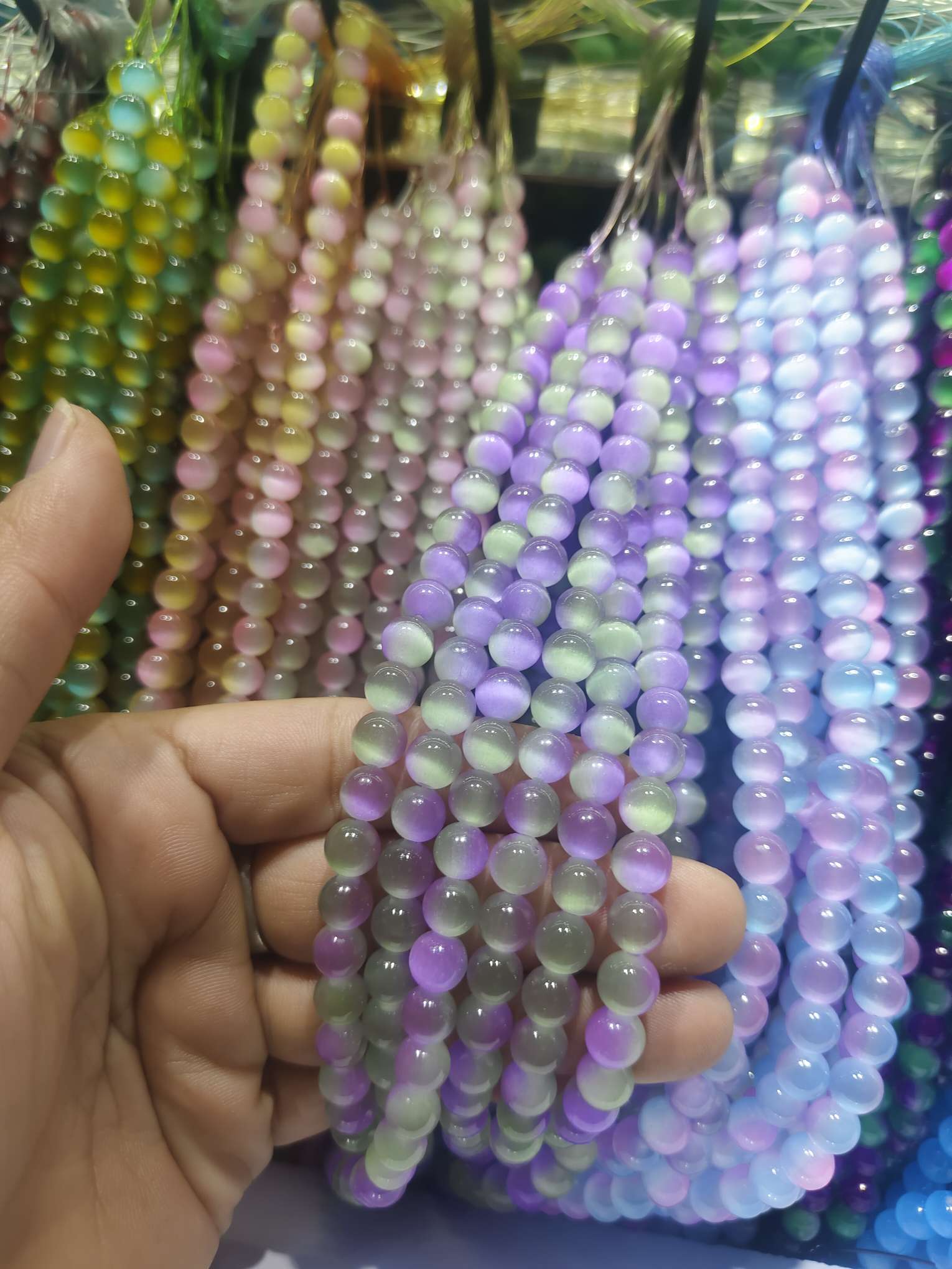猫眼石双色欢迎来采购猫眼石珠子散批diy手串配饰串珠猫眼珠合成石头半成品直孔圆珠 diy8MM时尚白搭猫眼圆珠配件厂家