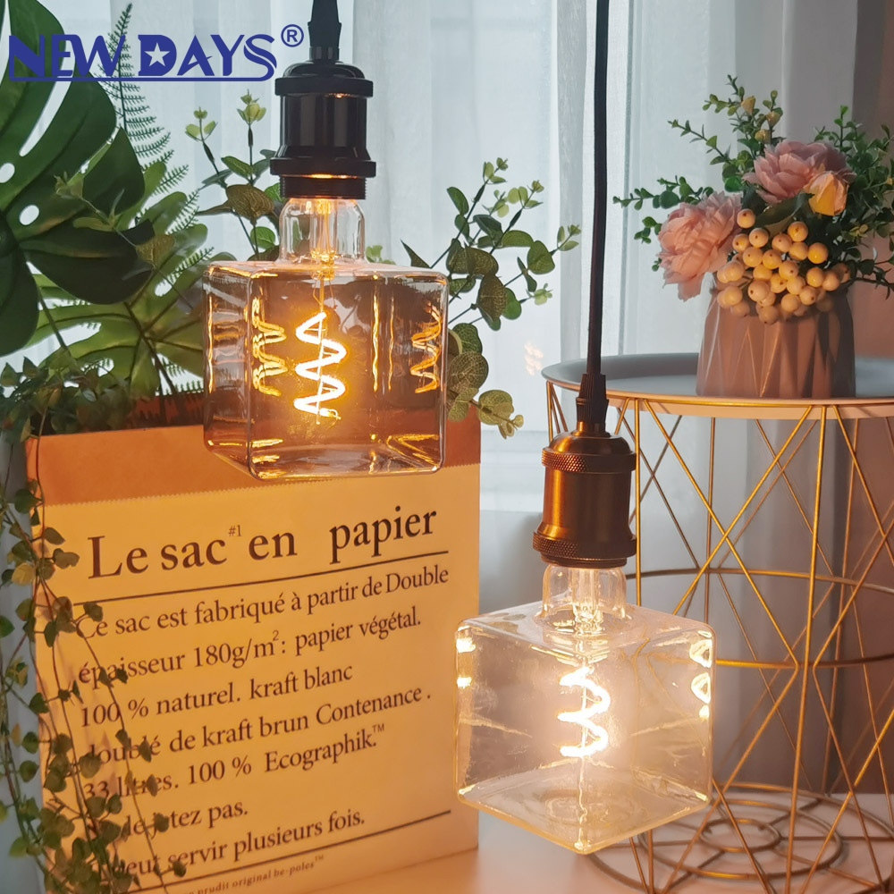 والمصابيح خيطية الشكل E27 الجديدة من طراز Newdays Newdays العابرة للحدود، والمصابيح الكهربائية المسطحة (EE 27) المنزلية التي تستخدم مسامير حديثة ذات كفاءة عالية من حيث الطاقة