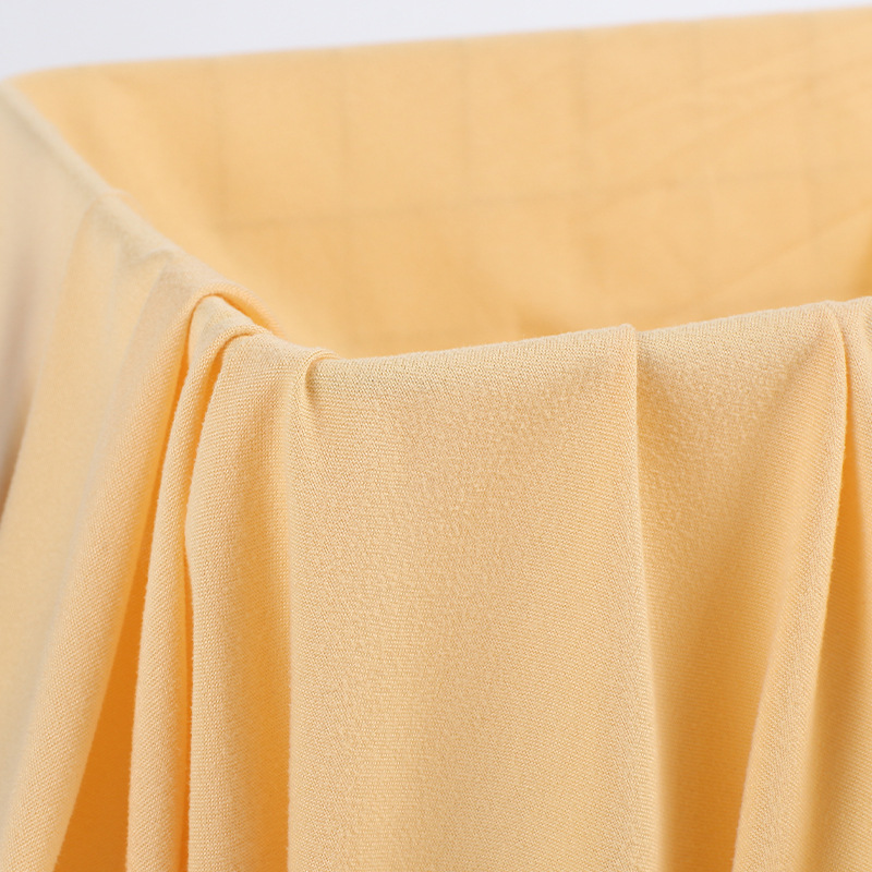 Milk silk pull frame knitted four-sided elastic T-shirt, yoga sportswear fabric, single-sided brushed polyester ammonia milk silk Specification image