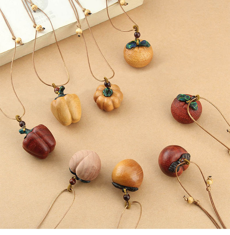 复古文艺植物果实型木质吊坠项链女简约小众编织长款毛衣链配饰品详情1